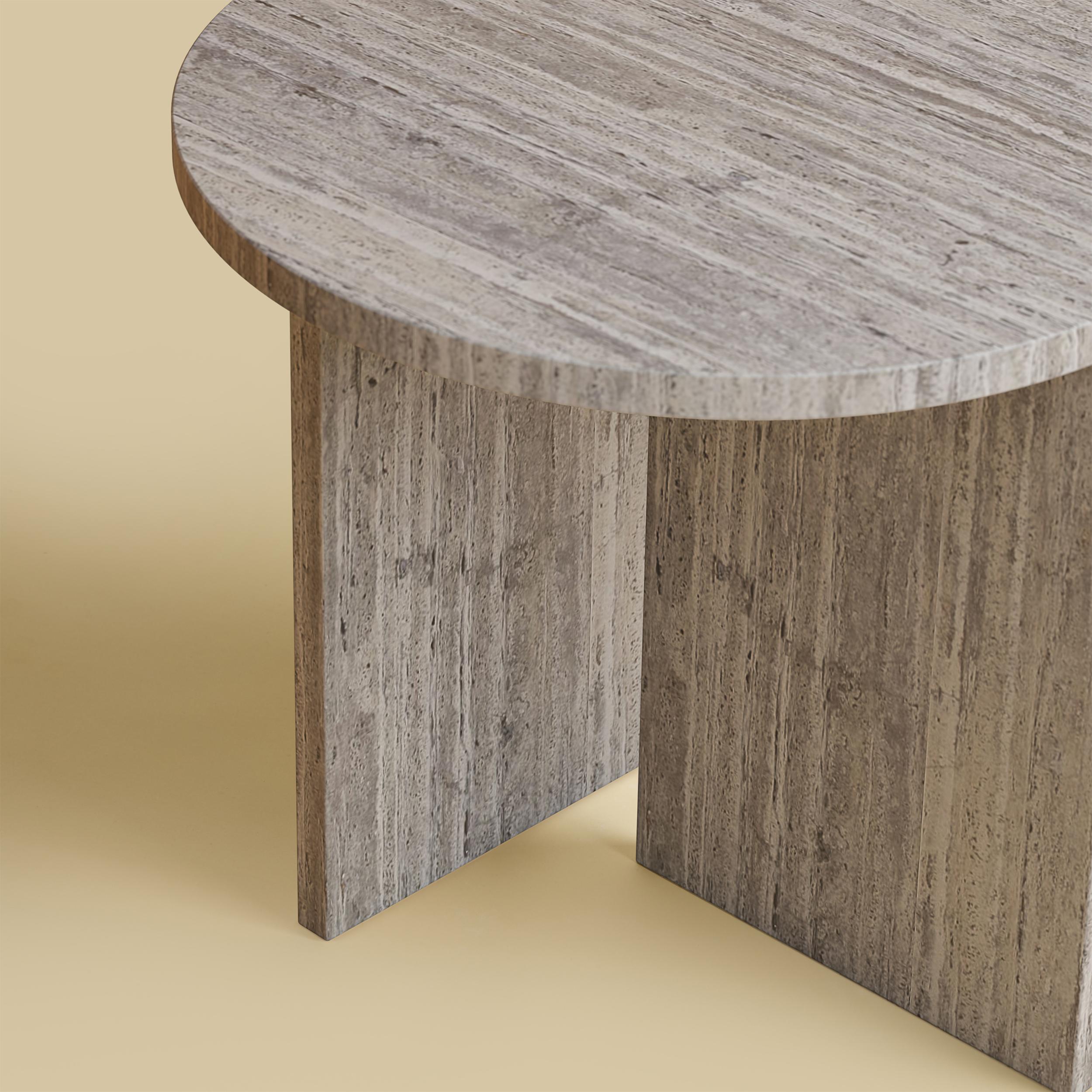 The Kyushu coffee table is made entirely of Titanium Travertine. The top is circular and 45cm in diameter, the legs are made from two marble boards in which one part is inlaid on the top as a very elegant detail.
Artisanal production made of
