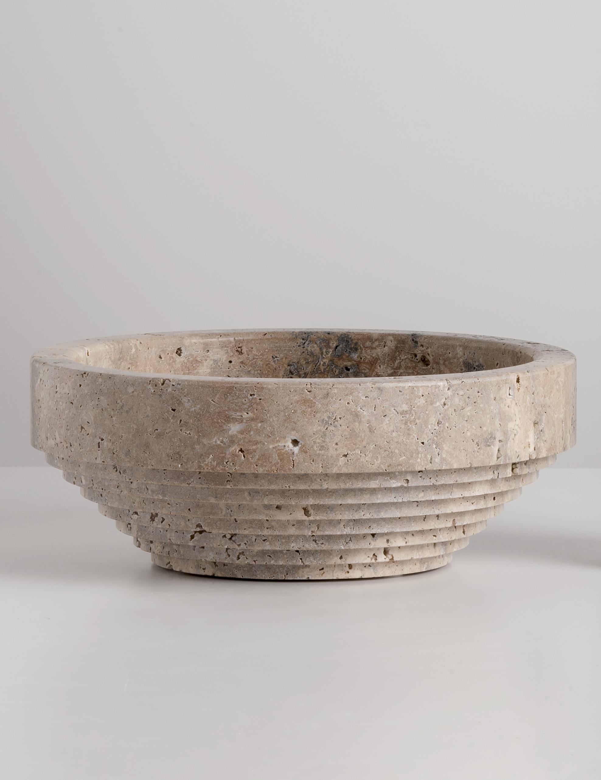 Travertine Trieste Bowl by Andrea Bonini
Limited Edition
Dimensions: Ø 25 x H 10 cm.
Materials: Travertine.

Limited series, numbered and signed pieces. Custom size or finish on request. Different marble options available: Palissandro tigrato,