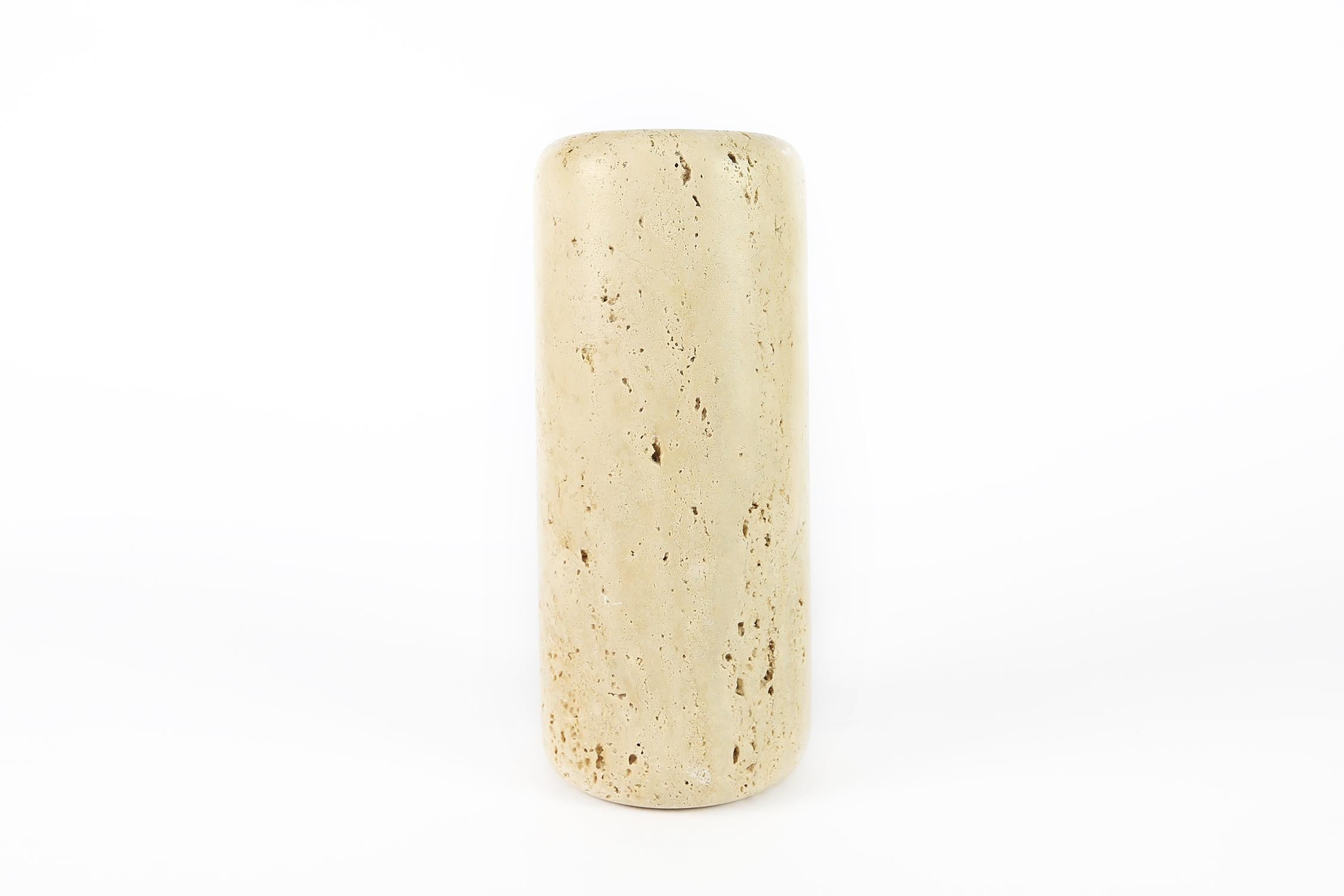 Travertine vase from Italy, reminds of the work of Angelo Mangiarotti.
 