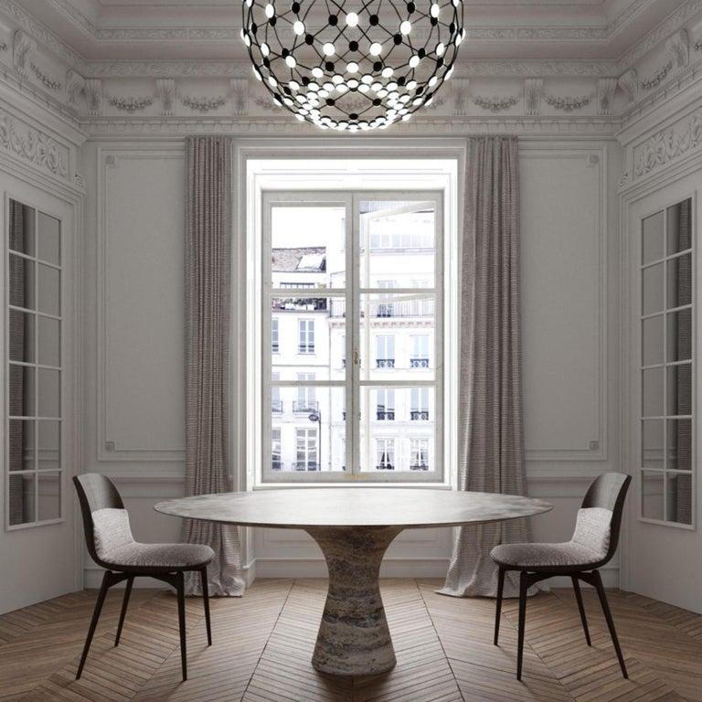 Travertino silver refined contemporary marble dining table 130/75

Angelo is the essence of a round table in natural stone, a sculptural shape in robust material with elegant lines and refined finishes.

The collection consists of a round/oval