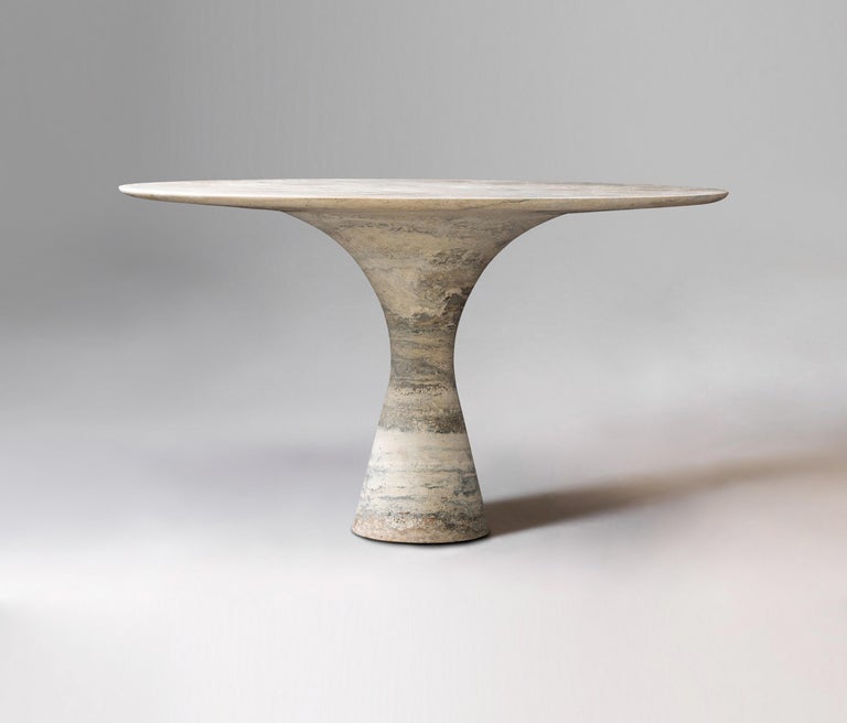 Travertino Silver Refined Contemporary Marble Dining Table 160/75
Dimensions: 160 x 75 cm
Materials: Travertino Silver 

Angelo is the essence of a round table in natural stone, a sculptural shape in robust material with elegant lines and refined