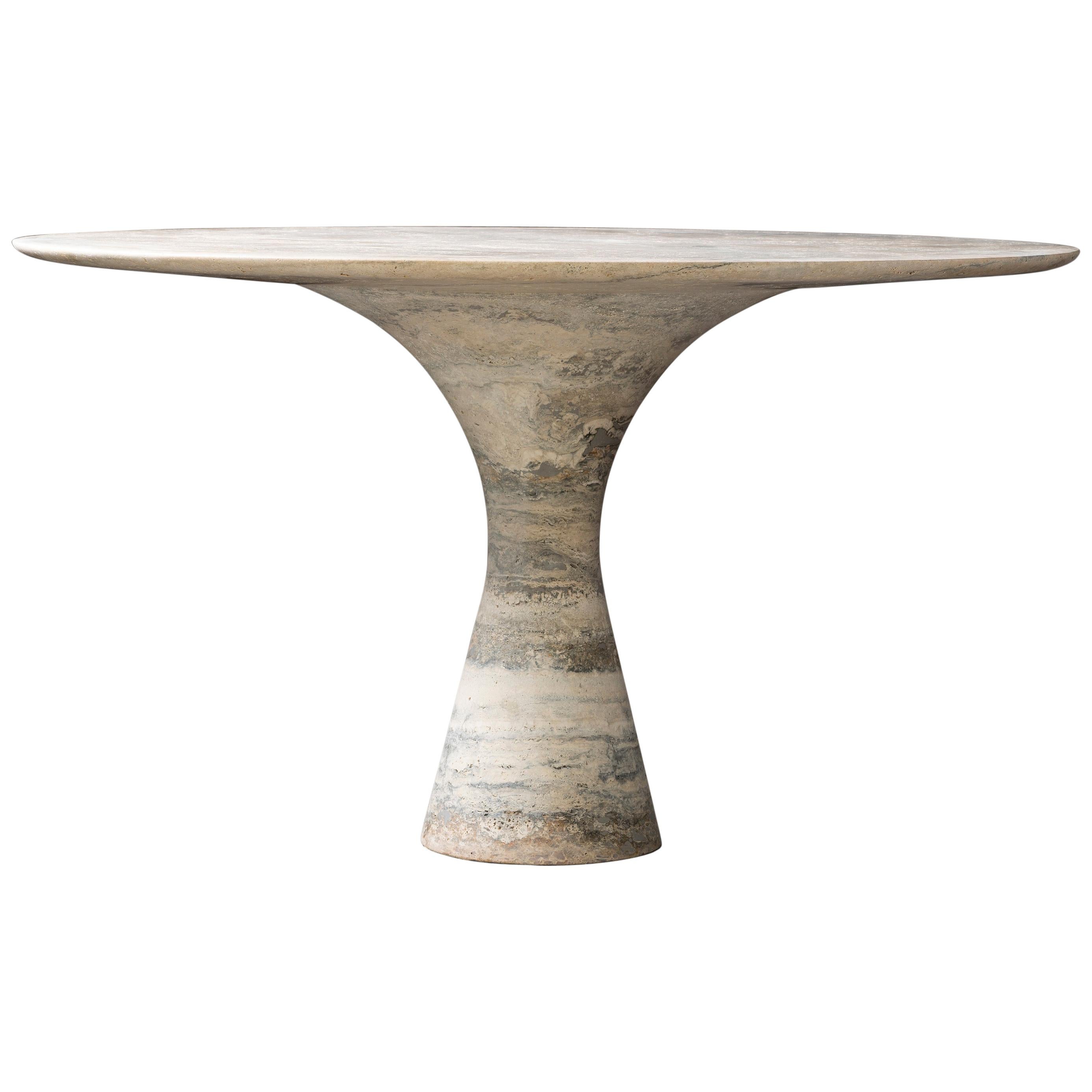 Travertino Silver Refined Contemporary Marble Dining Table 250/75
Dimensions: 250 x 160 x 75 cm
Materials; Travertino silver

Angelo is the essence of a round table in natural stone, a sculptural shape in robust material with elegant lines and