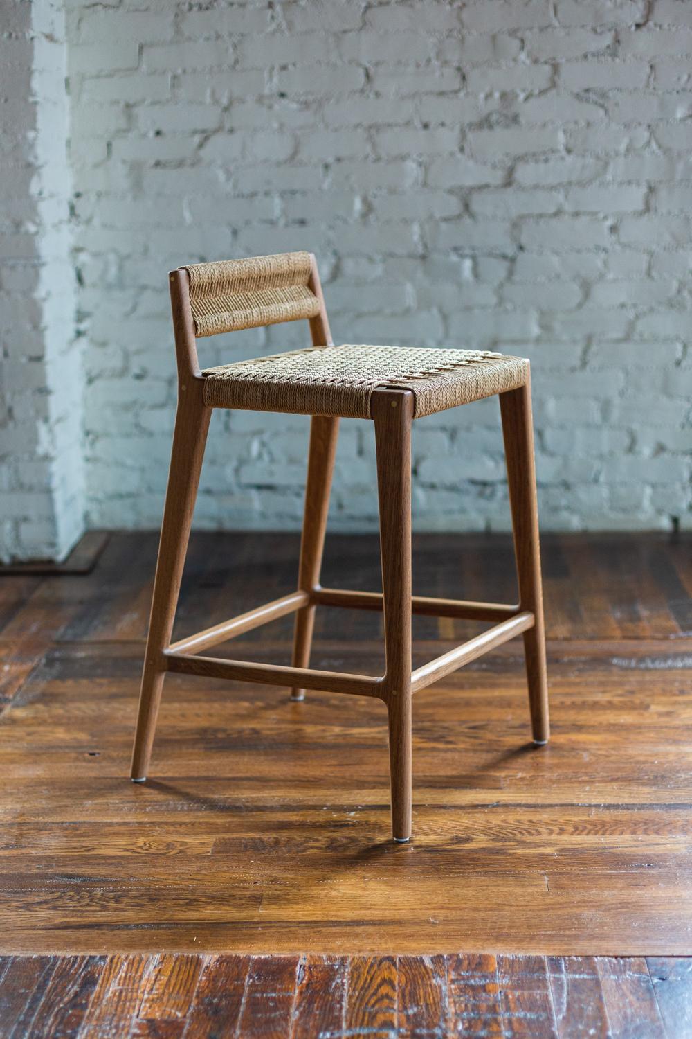 Clean, modern angles complimented by the warm texture of the Danish cord. The Travis stool can be made counter-height or bar-height with any of the dimensions customizable.

Designed, built, finished, and woven from start to finish in our studio.