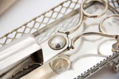 Tray & Morrões Scissors in smooth silver w/ a rack & four spherical-shaped feet