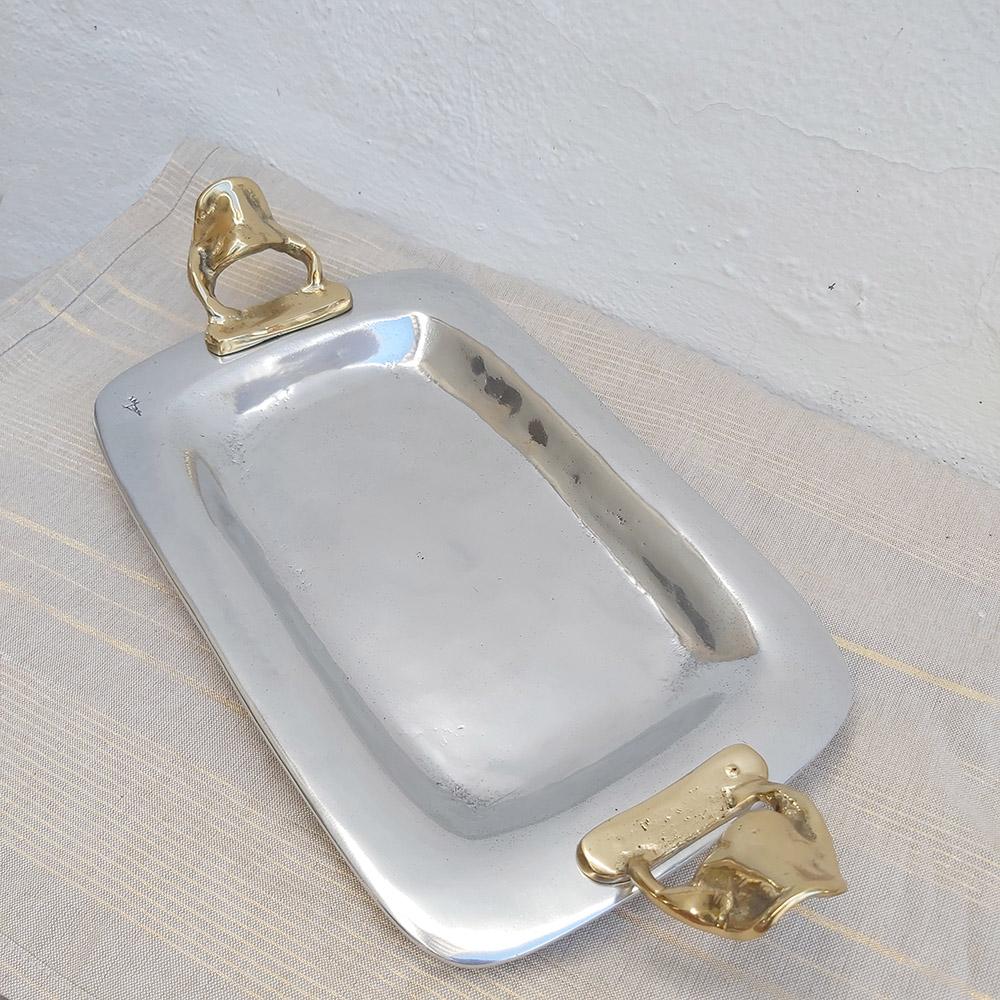 The decorative Tray was created by David Marshall, it is made of sand cast aluminum and sand cast brass. 
Handmade, mounted and finished in our foundry and workshop in Spain from recycled materials.
Certified authentic by the Artist David Marshall