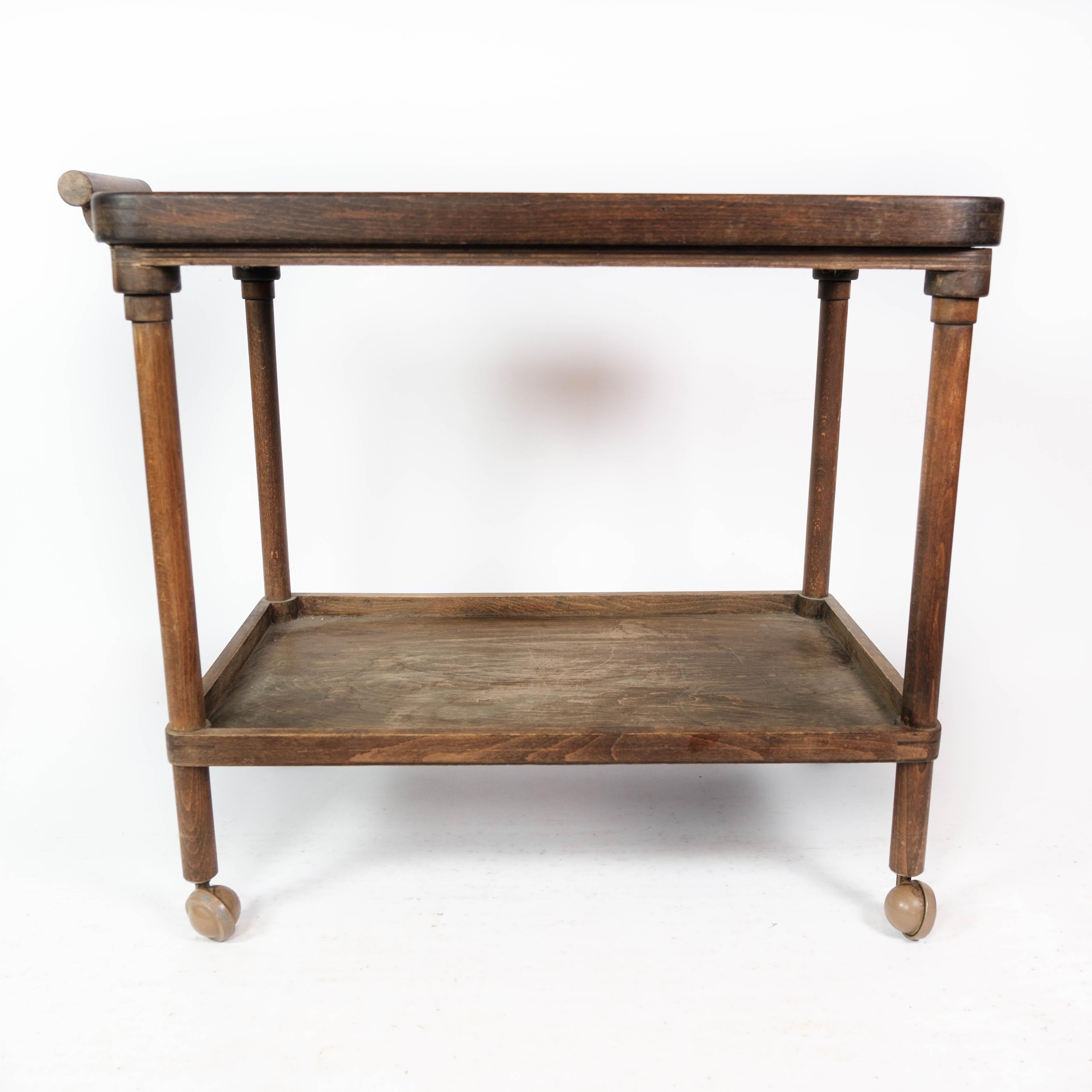 Tray table dark wood decorated with dutch tiles, in great antique condition from the 1920s.