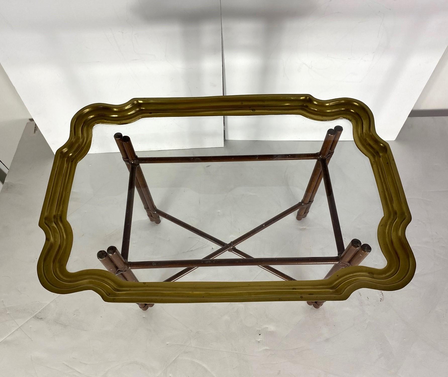 Glass with a brass trim tray with metal base.
