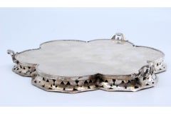 Tray w/ lobed rack & floral-engraved bottom on 3 cut-out feet