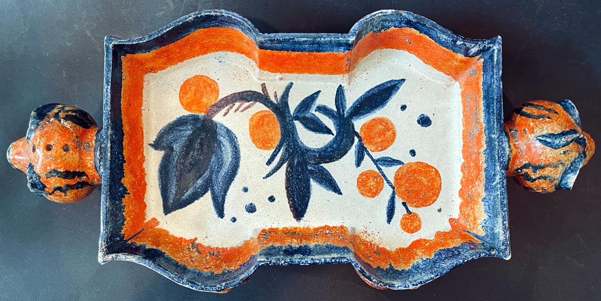 A product of the Wiener Werkstätte or Vienna Workshop -- one of the greatest centers of Modern design to emerge in Europe in the early 20th century -- this unique, vividly glazed ceramic tray was made by Wally (or Vally) Wieselthier. The tray is
