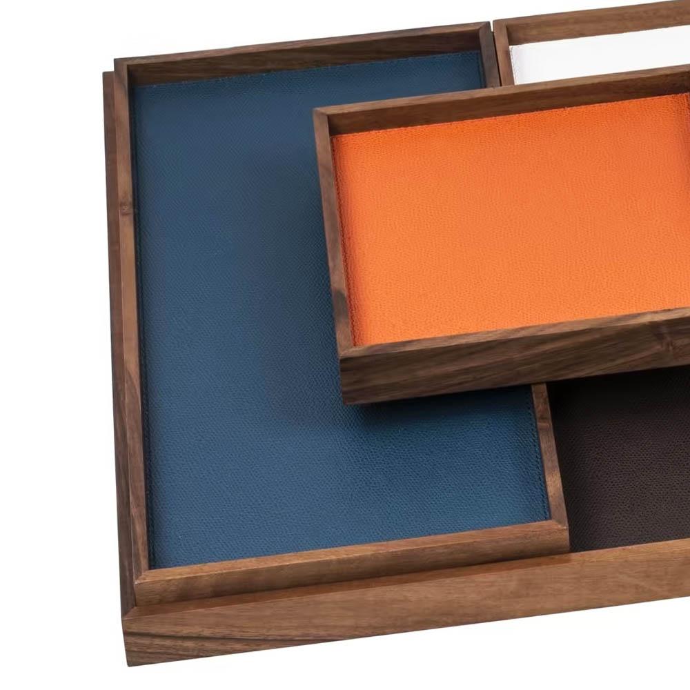 Trays blue bay set of 4 with structure and
Frame in solid walnut, each tray is covered
With natural genuine leather, 1 trays in deep
Brown, 1 tray in deep blue, 1 tray in orange
And 1 tray in white genuine leather.