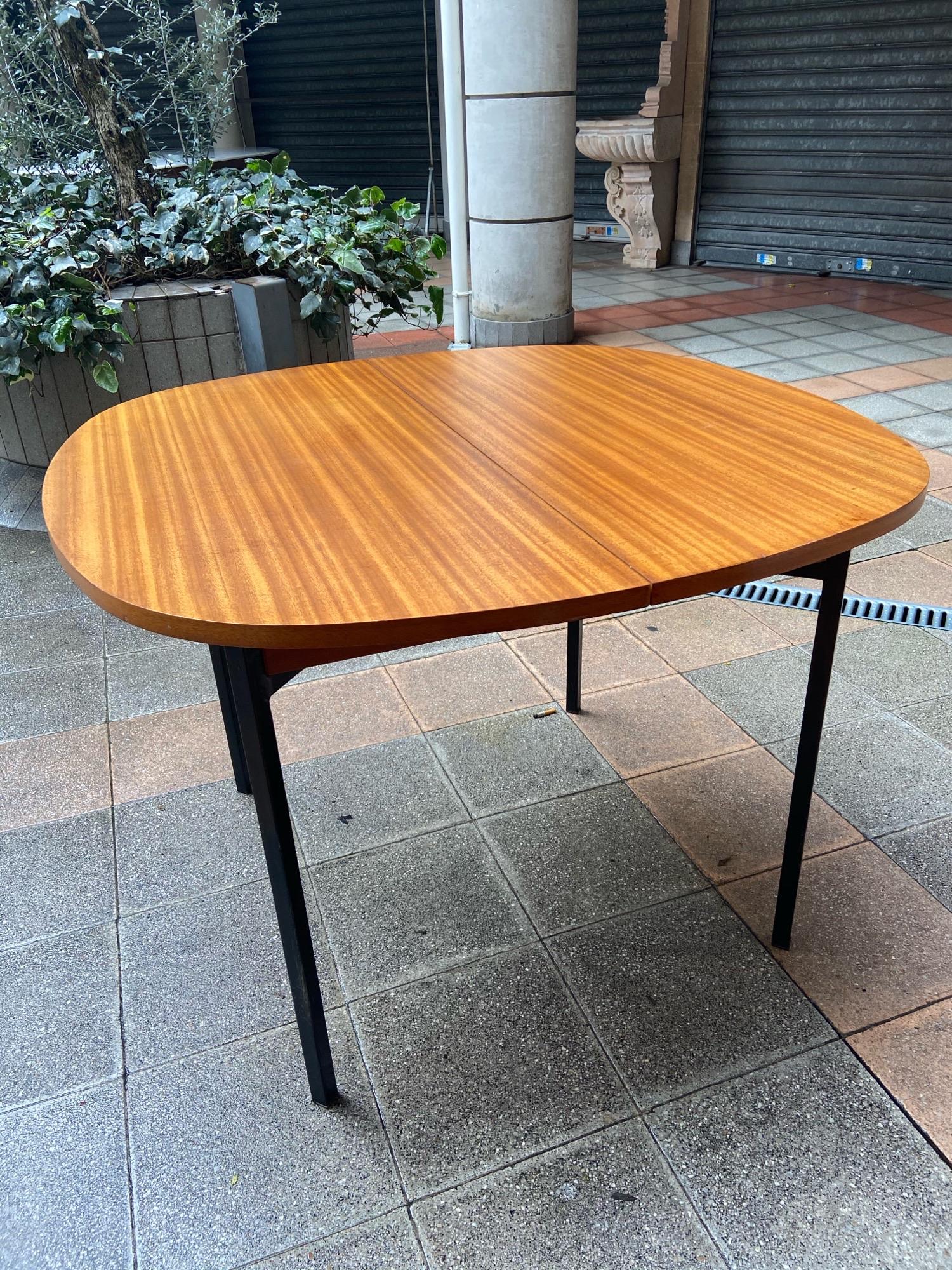 TRC20 system dining table- Pierre Guariche

Huchers Minvielle edition,
Circa 1960
Perfect condition 

Mahogany and black metal 
Integrated extension leaf 

Closed 
Dimensions W 105 x D 105 x H 74

Open 
W 155 x D 105 x H 74

1490€.