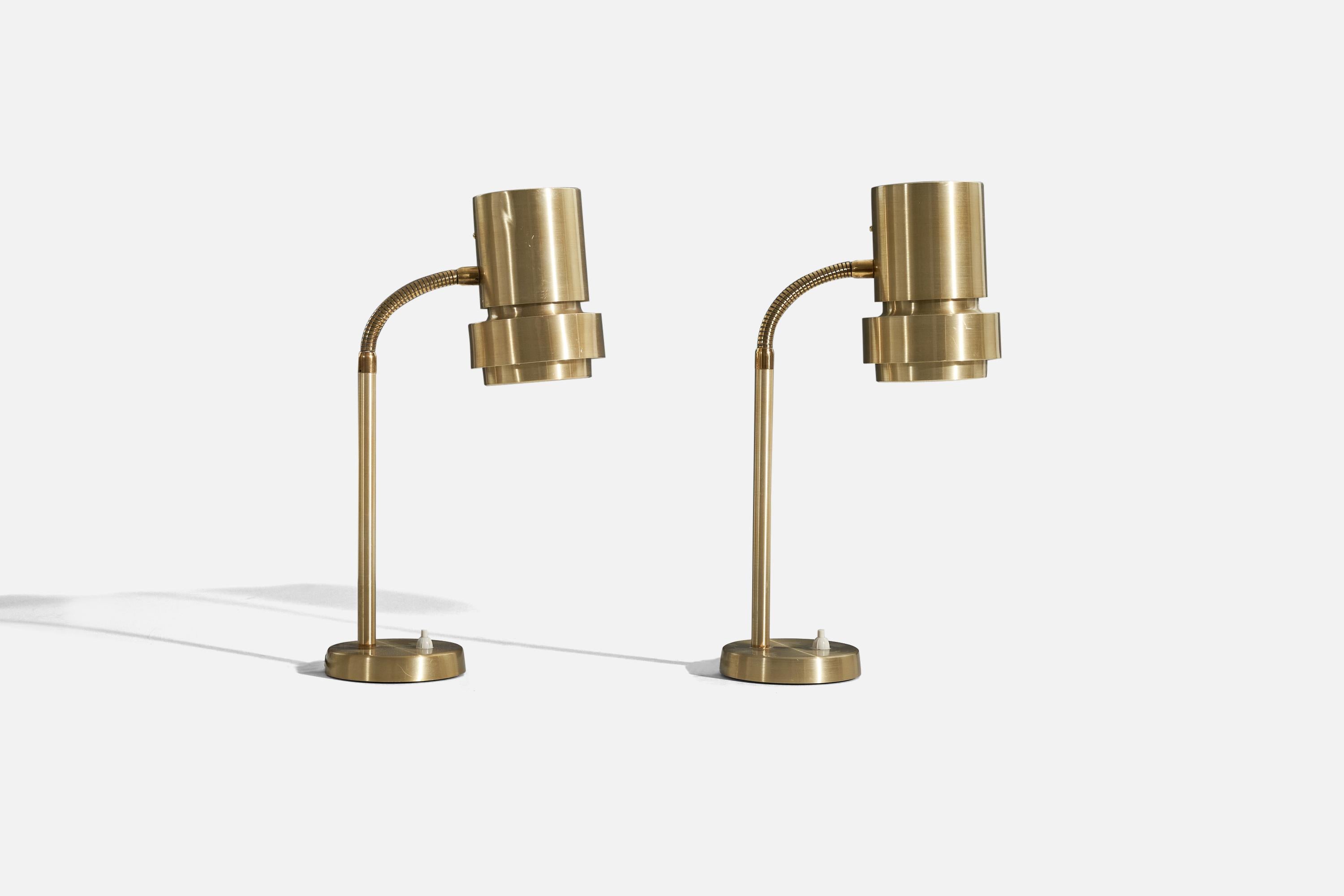 A pair of brass table lamp designed and produced by TR&Co, Norway, 1960s. 

Variable dimensions, measured as illustrated in the first image.