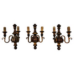 Three wooden wall sconces
