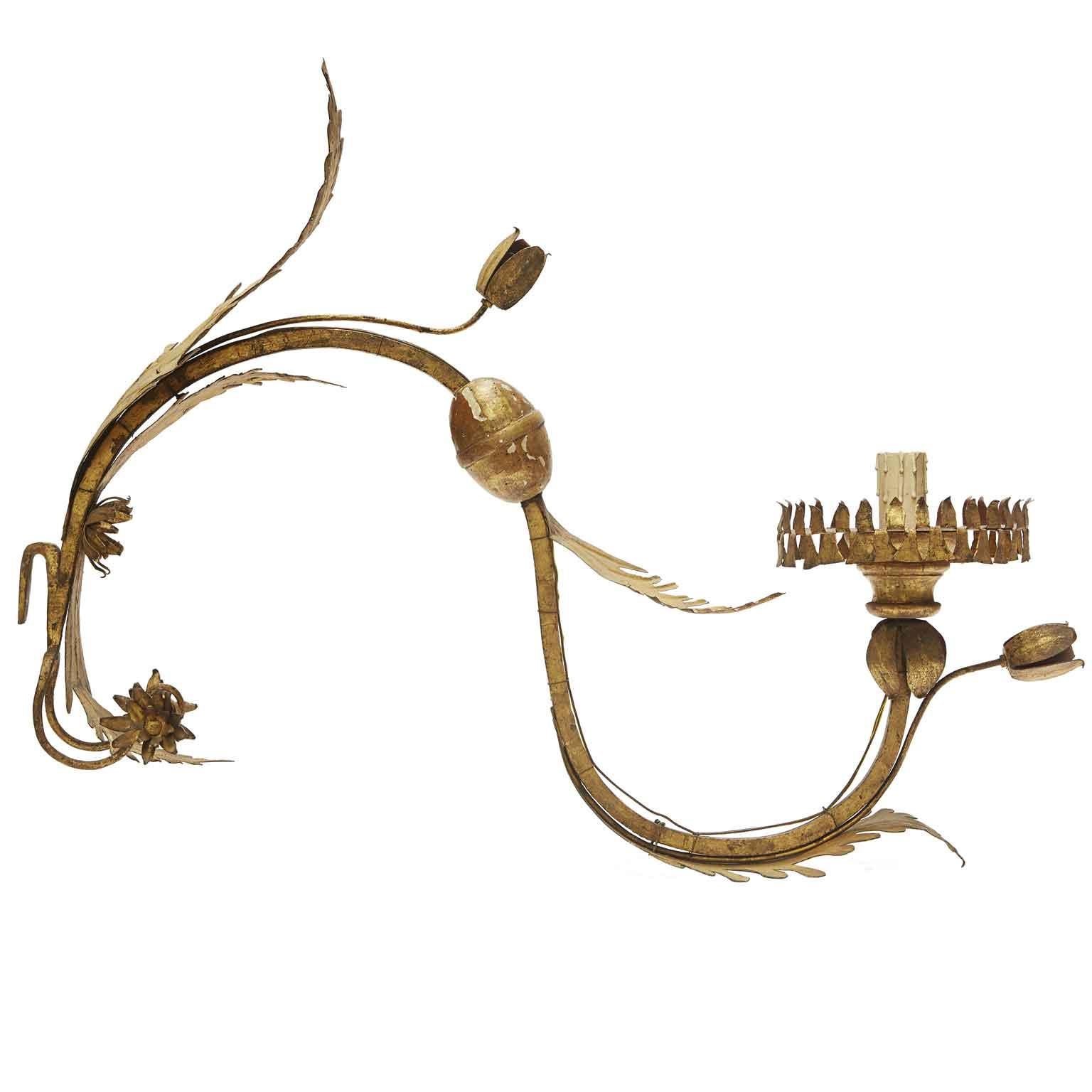Three Gilded Appliques 1700 Wrought Iron Candle Holder Arms in Leafy and and Floral Motifs, lot of three antique wall lights, candle holder arms  eighteenth-century period, curved arms with double volutes, with important dimensions, entirely