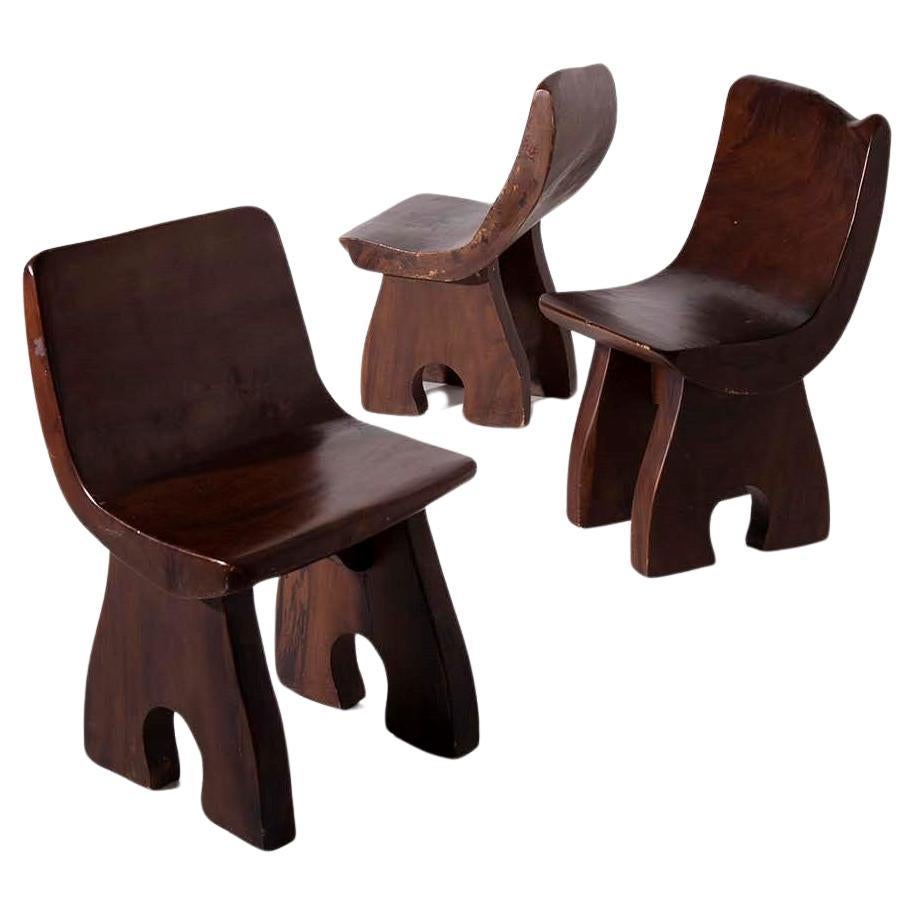 Three wooden chairs attributed to Jose Zanine Caldas, 1950s For Sale