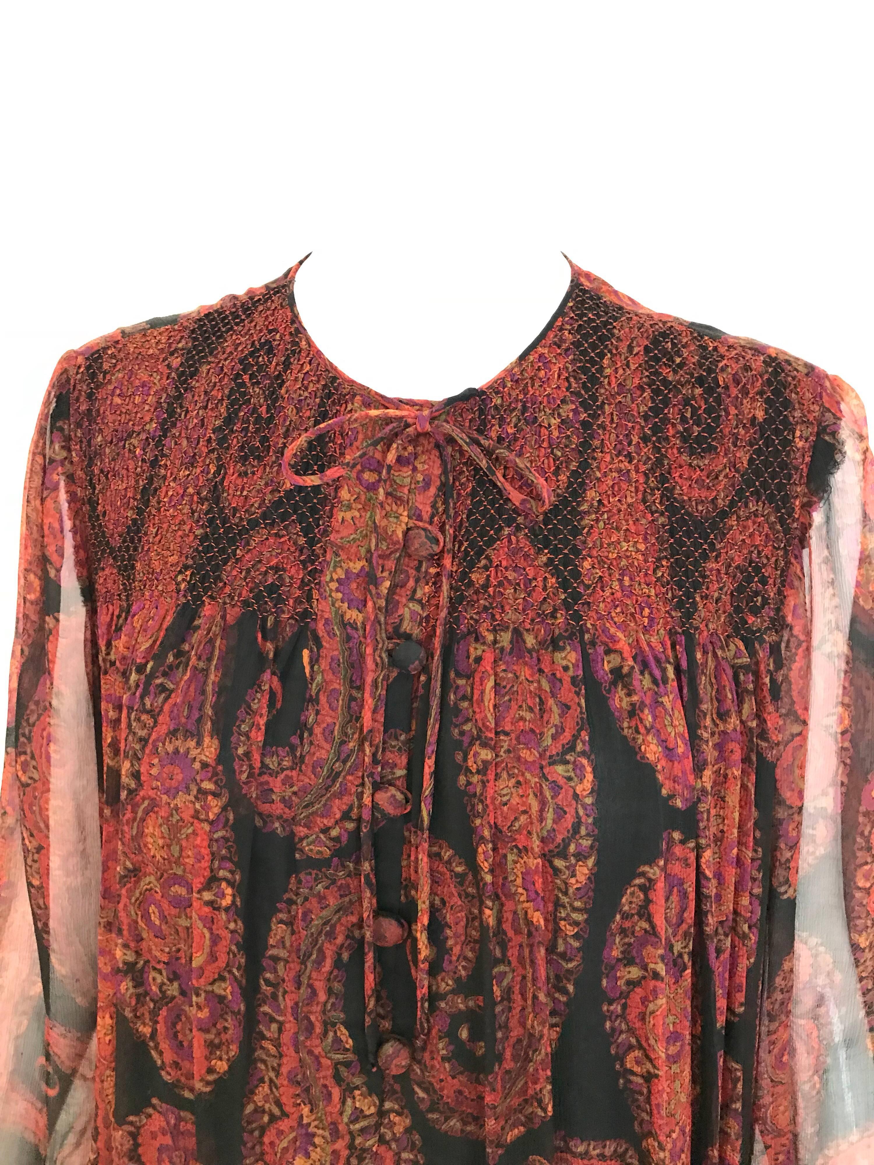 Bohemian 1970s Black ,red, orange paisley silk print long sleeve maxi dress from Treacy Lowe. Fit Medium - Large. 6/8/10