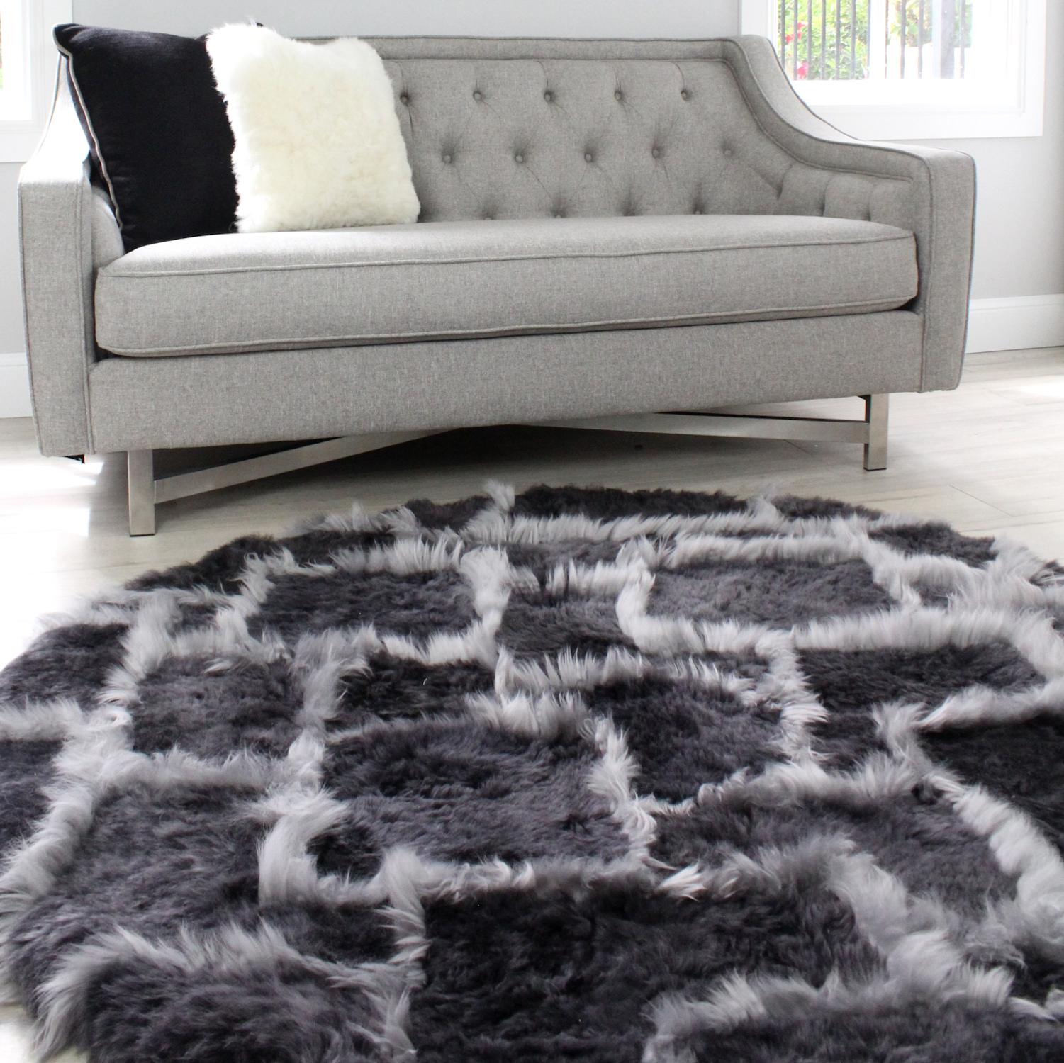 This Treasure Patchwork Sheepskin rug is a rare and unique designer floor rug custom made by eluxury home. It is handcrafted in Australia with intricate patchwork detailing with unparalleled sheepskin craftsmanship using only the finest of