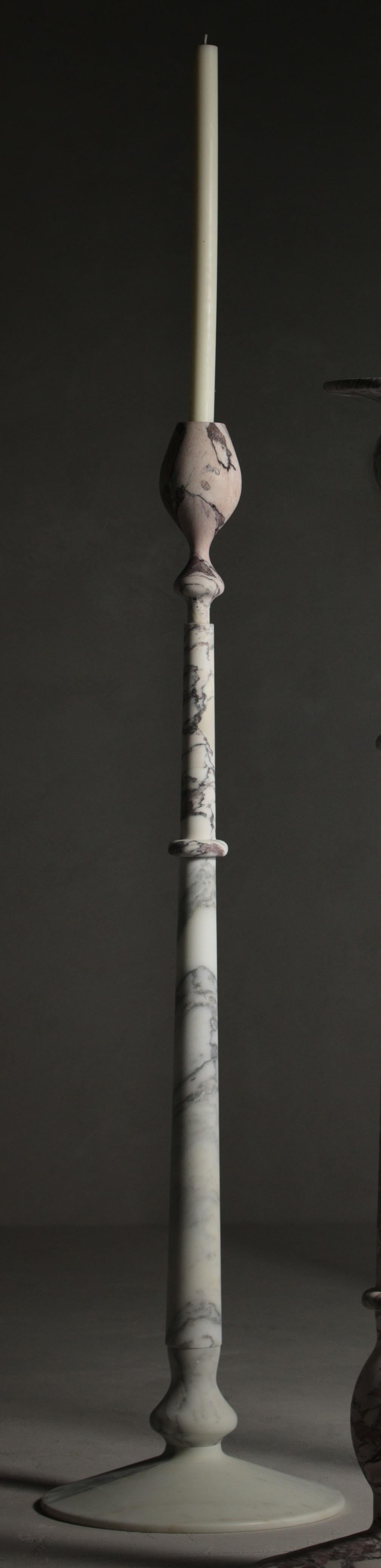Treasure S Candlestick by Kreoo 
Designed by Christophe Pillet
Dimensions: Ø 43 x H 153 cm.
Materials: Arabescato, Breccia Medicea, and Rosso Lepanto marbles.

Available in different marble options. Available in four different sizes. Please contact