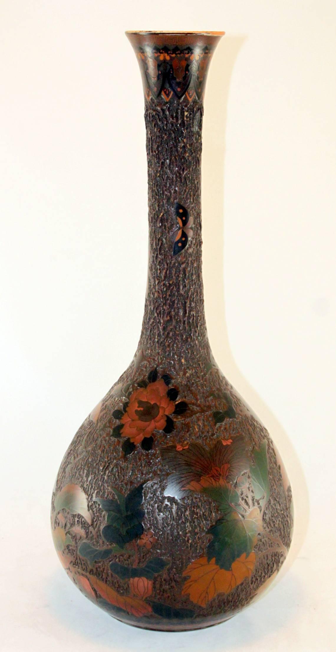 “Tree-Bark” cloisonne Japanese Jiki-shippo cloisonne’ on porcelain bulbous vase 
19th century 

Jiki-shippo literally, “porcelain-enamel,” is enamel work that is decorated on a porcelain body or foundation that has been fired at a high