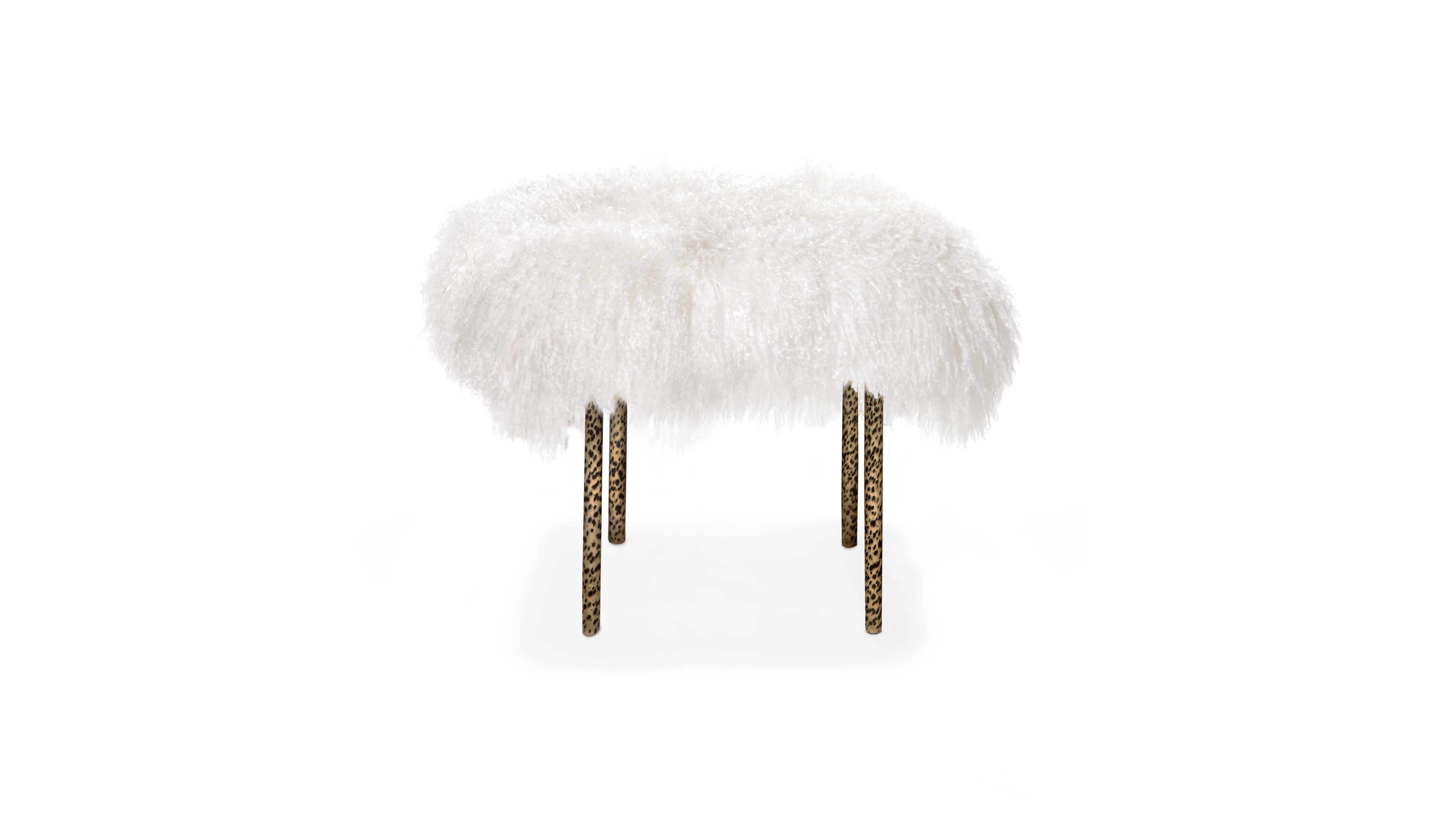 The tree branches bench is entirely handcrafted in brass with a hammered technique similar to the irregular details of real branches.

The top in Mongolian Lamb fur completes this creation by evoking the wild side of nature. 

Thought to be unique