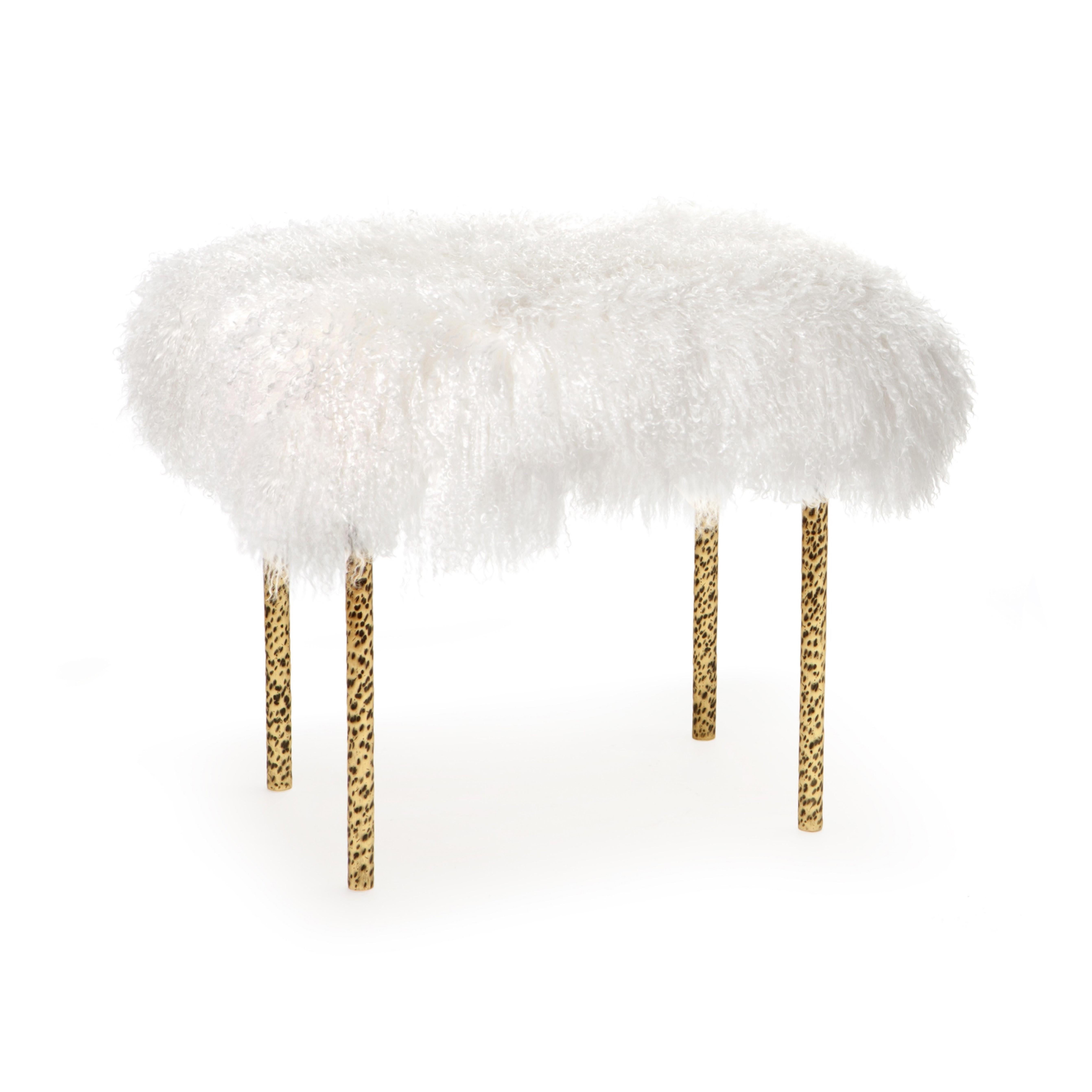 The tree branches bench is entirely handcrafted in brass with a hammered technique similar to the irregular details of real branches.The top in Mongolian Lamb fur completes this creation by evoking the wild side of nature. 
Thought to be unique but