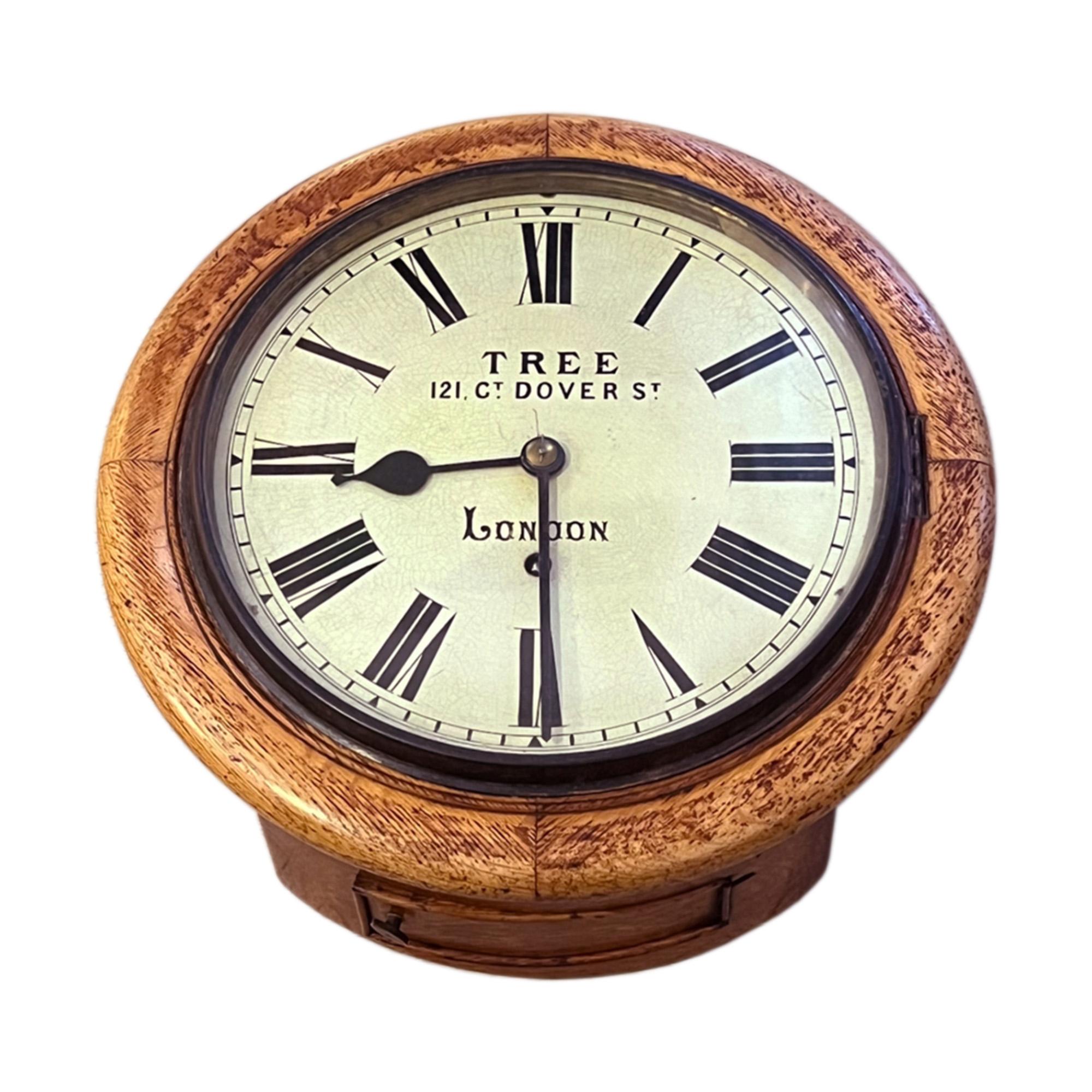 This is a lovely traditional English Victorian wall clock with an oak wood case. This style of clocks were often seen in large public places such as banks, schools and train stations. 

This particular time piece has been carefully cleaned and