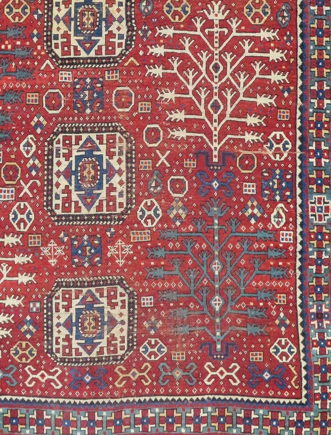 Caucasian tree Kazak rug, 19th C (4th Q). Measures 5'9