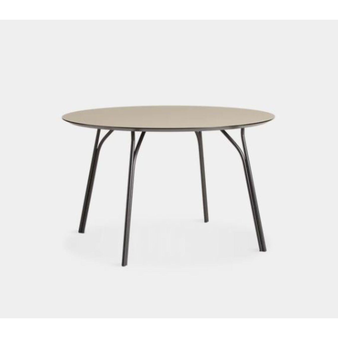 Tree medium dining table by Elisabeth Hertzfeld.
Materials: fenix Laminate, metal. 
Dimensions: D 120 x W 120 x H 74 cm.
Also available in different colours and dimensions.

The founders, Mia and Torben Koed, decided to put their 30 years of