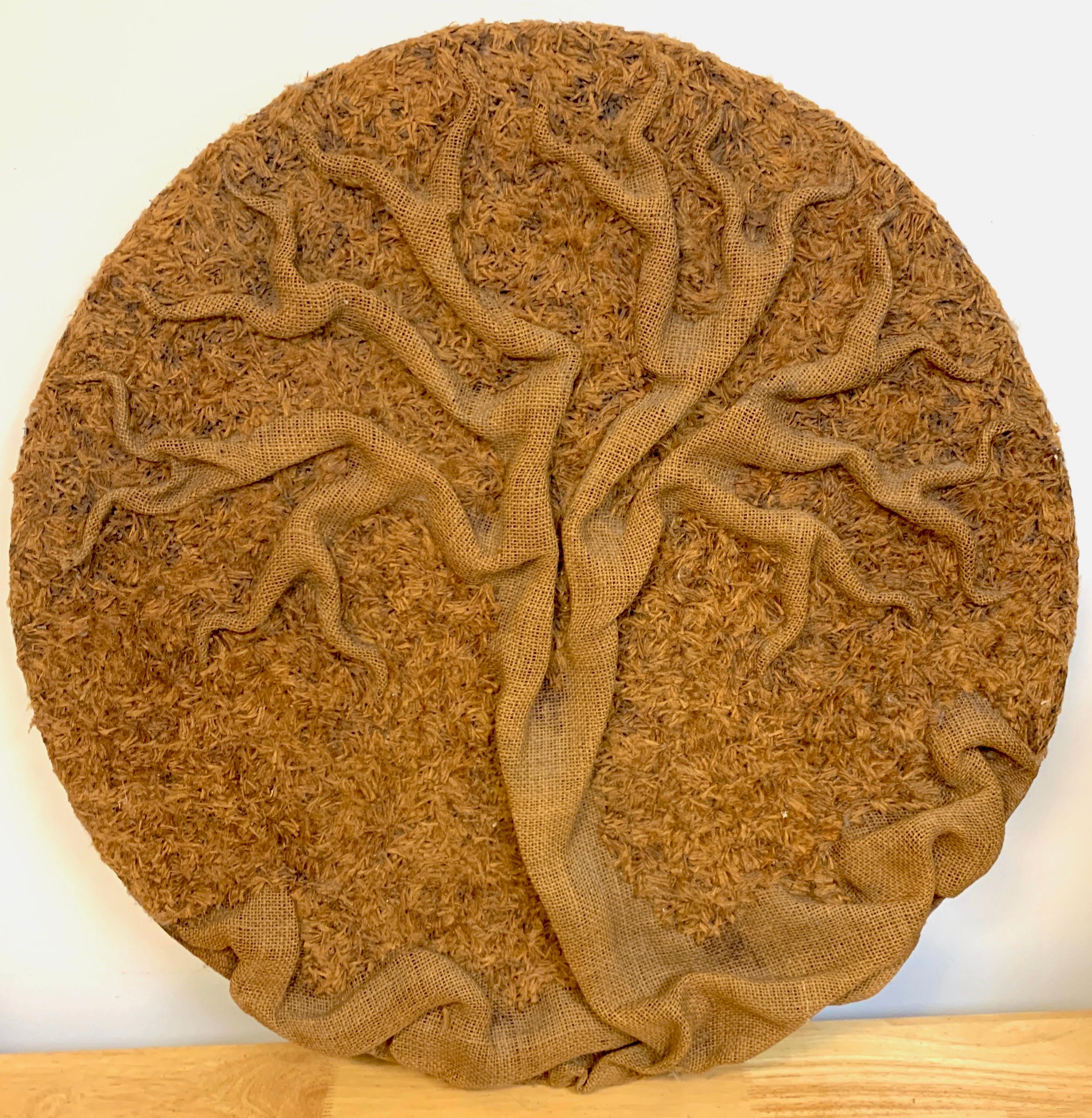 'Tree of Life' fiber art wall plaque by N. Brott, 1980 
Of circular form woven and modeled fabric rendition of the 'Tree of Life' 
Signed and dated on the reverse 'N. Brott, 1980'.