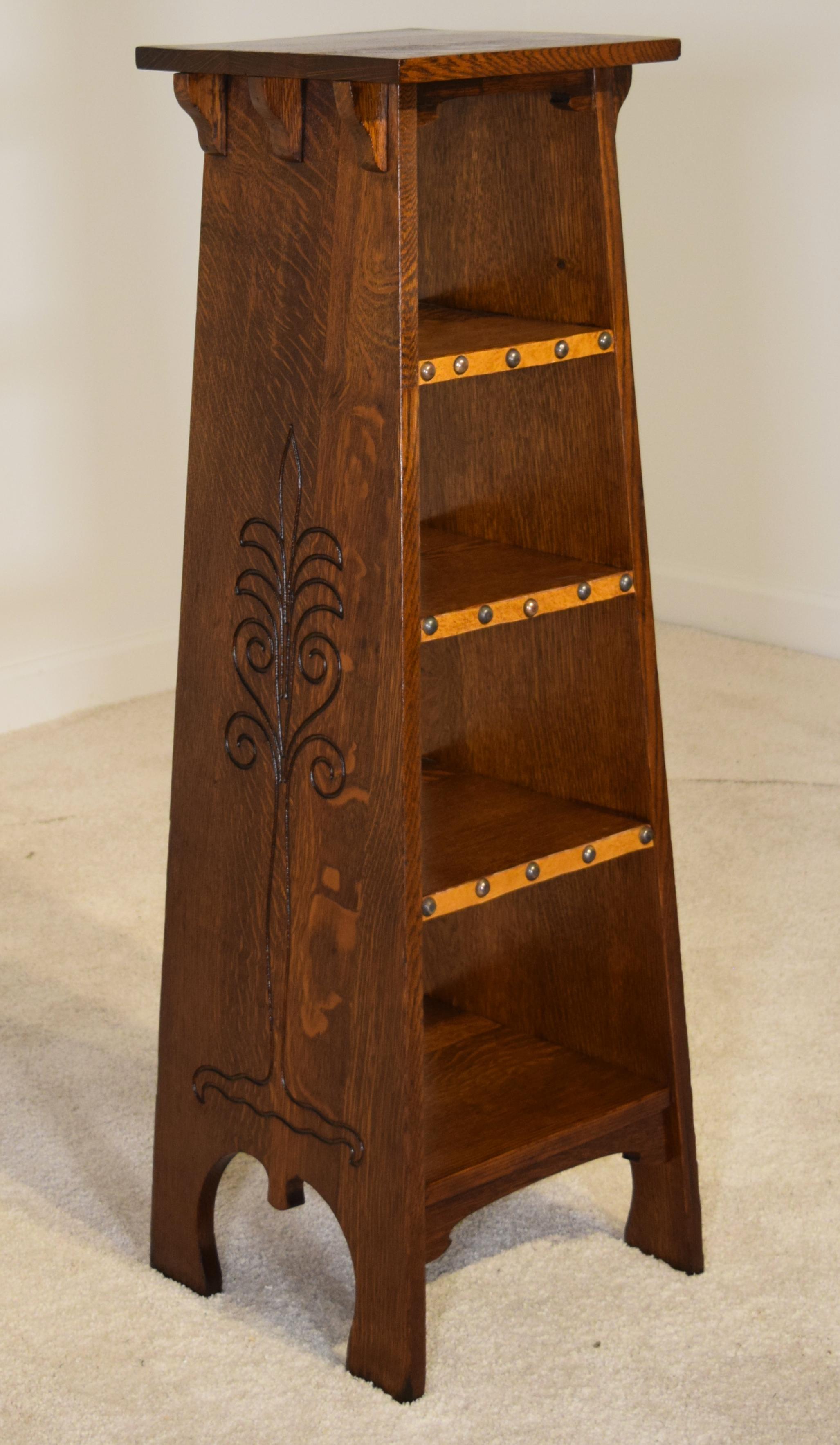 Gustav Stickley (1858-1942) for Tobey Furniture Company, Tree of Life stand
Chicago, Illinois with oak, brass, leather. Circa 1900.
14 1/2