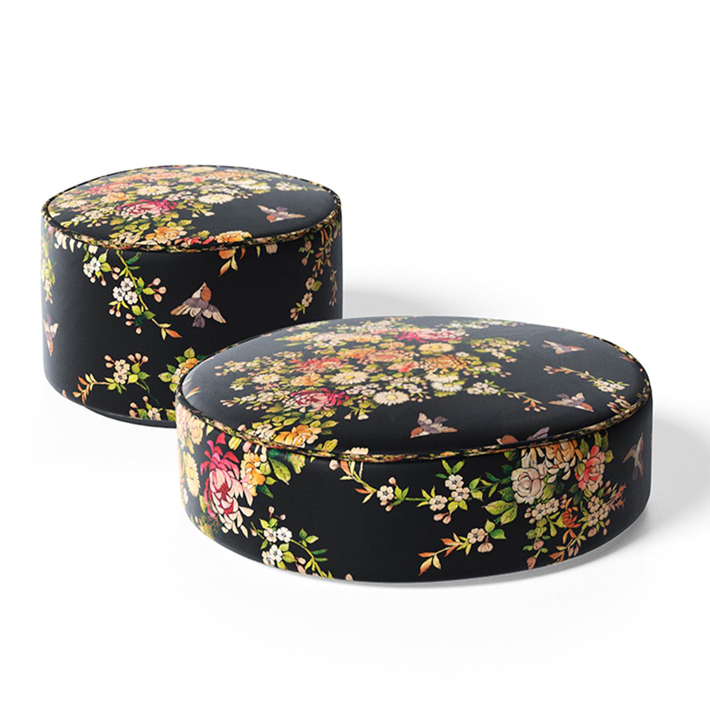 Pouf with black or white lacquered wooden base, self-supporting foam padding. Upholstery in printed synthetic fabric “Tree of Life” by Simone Guidarelli on a black or cream background.