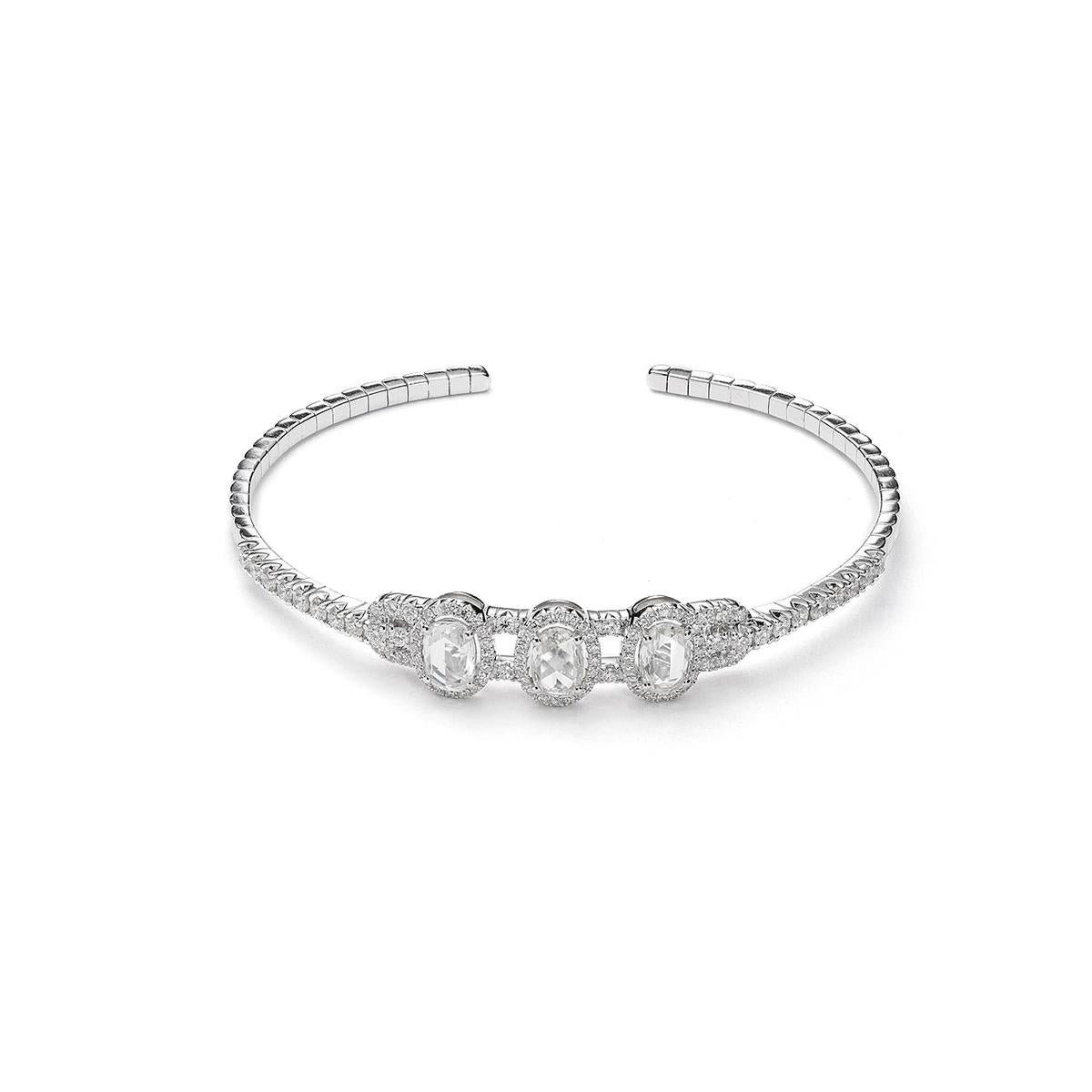 Bangle in 18kt white gold set with 3 oval rose cut diamond 1.85 cts and 96 diamonds 1.46 cts     