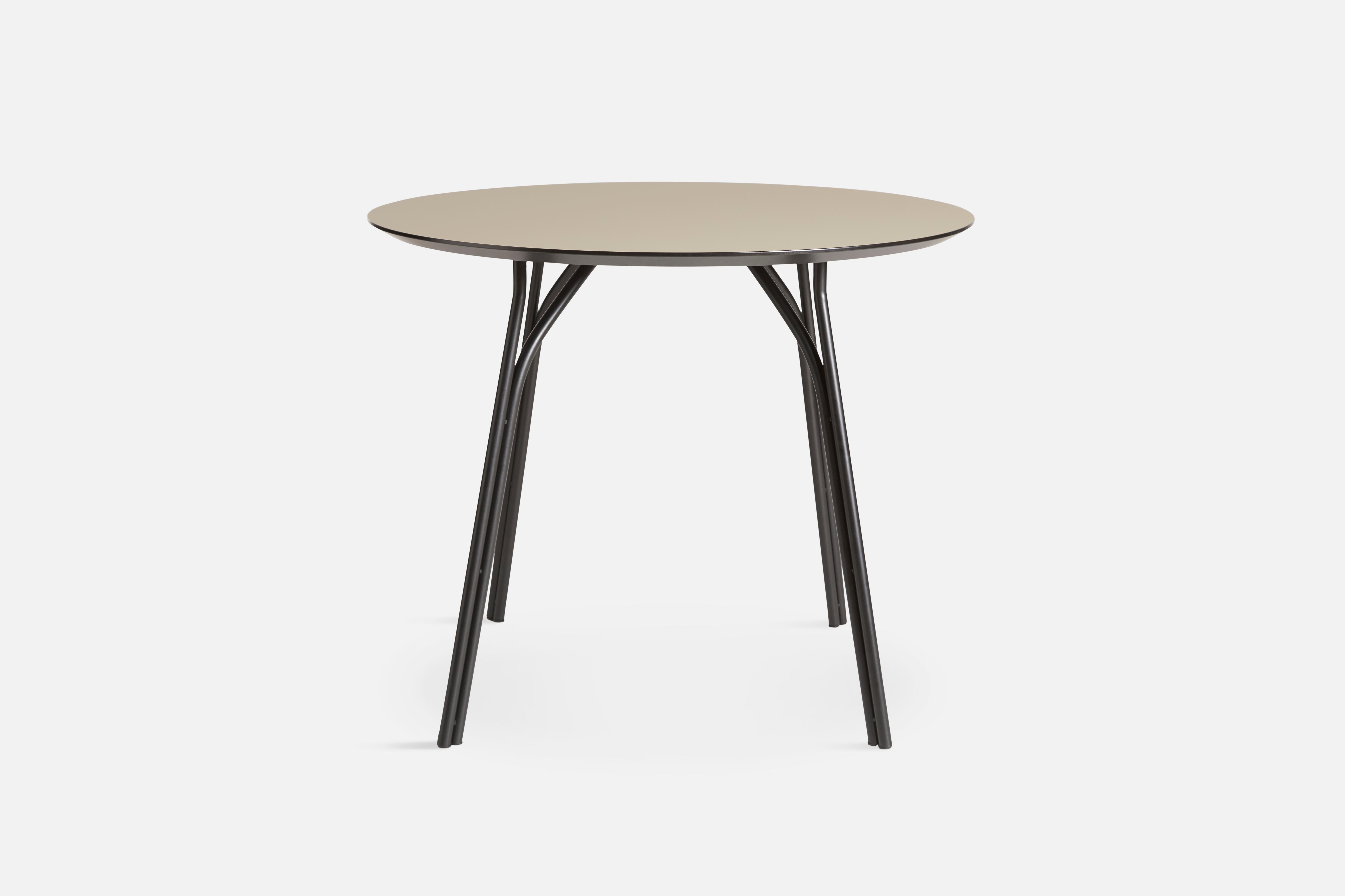 Tree small beige black dining table by Elisabeth Hertzfeld
Materials: Fenix Laminate, metal 
Dimensions: D 90 x W 90 x H 74 cm

The founders, Mia and Torben Koed, decided to put their 30 years of experience into a new project. It was time for a