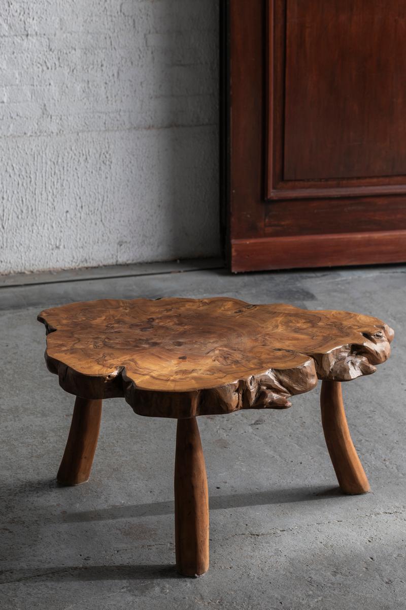 Tree trunk coffee table made in France in the 1970s. This item, made out of solid root wood or as the French call it ‘bois de loupe’, is in very good condition as shown in the pictures. We have one matching tree trunk stool left, not included in the