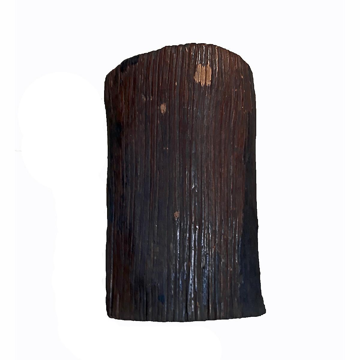 A solid wood tree trunk repurposed into a singular end or side table. 
Dark brown finish, polished smooth top. 
Can also be used as a stool or pedestal.
     