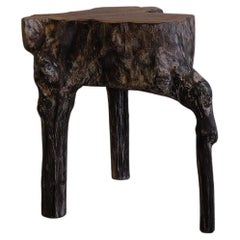 Tabouret en tronc d'arbre