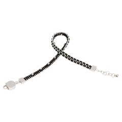 Bracciale Treesure in oro bianco 18 Kt e pura seta nera con perline tagliate a diamante