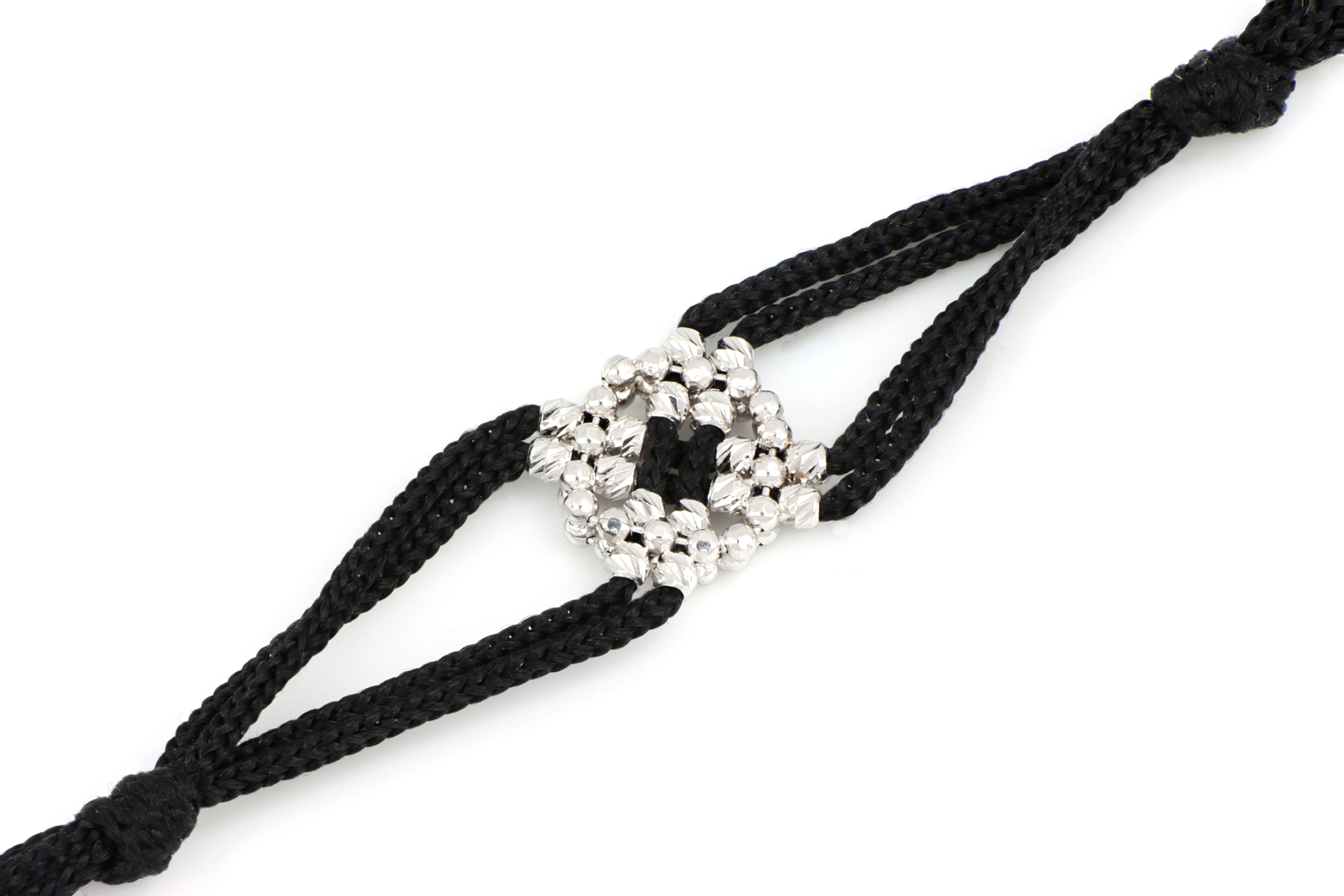 Made in Italy, the Treesure creations are a unique combination of the preciousness of gold and the sinuosity of the finest of all yarns. 
This exclusive jewel is made with 18 Karats gold and the only silk that is produced entirely in Italy,