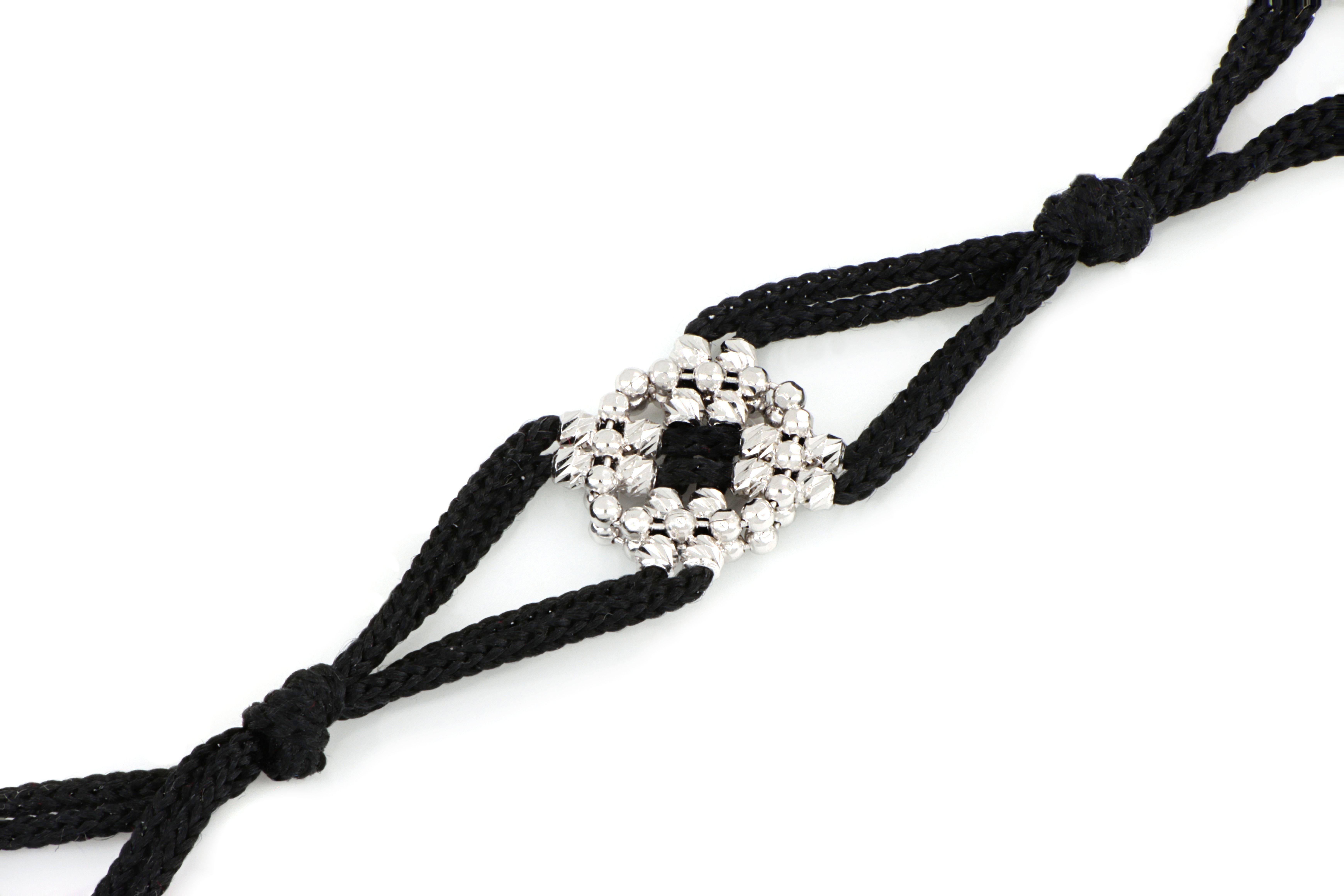 Made in Italy, the Treesure creations are a unique combination of the preciousness of gold and the sinuosity of the finest of all yarns. 
This exclusive jewel is made with 18 Karats gold and the only silk that is produced entirely in Italy,