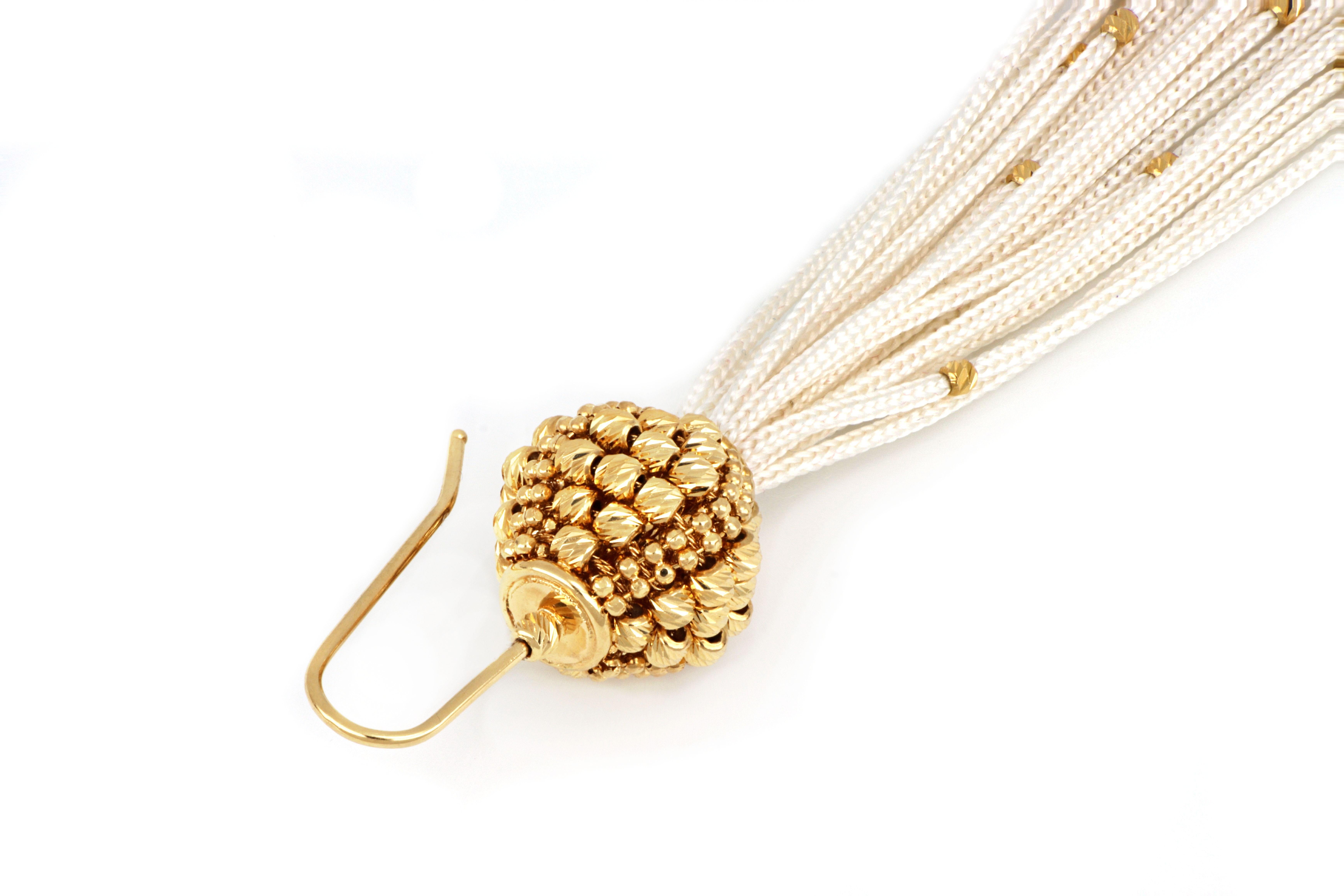 Modern Treesure 18 kt yellow Gold and white Silk long Earring with diamond cutted beads For Sale