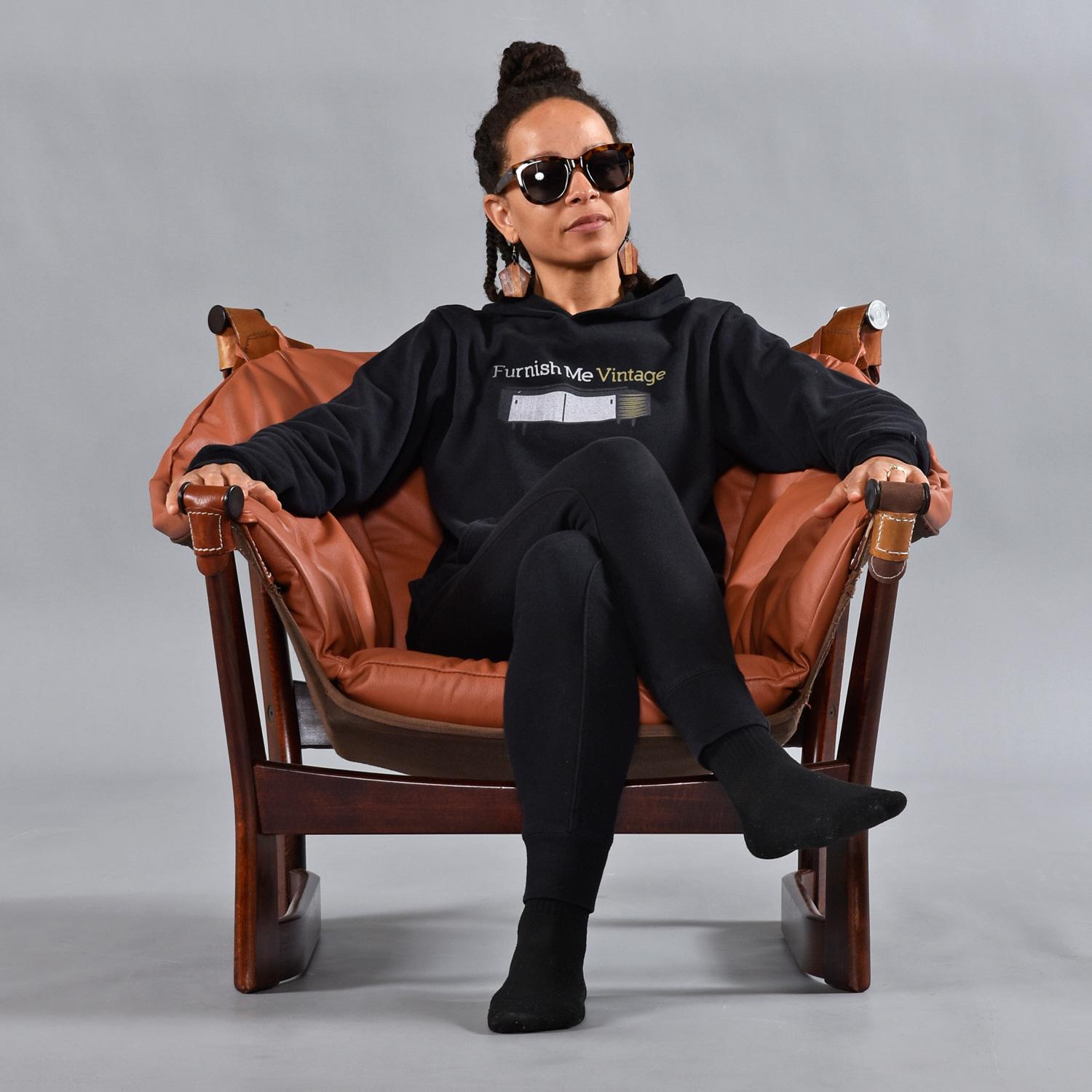 This Rosewood Leather Sling Lounge Chair by Tormod Alnæs was completely disassembled and each piece of rosewood re-glued and detailed.   The frame is now rock solid and special care was given to each joint to ensure rigidity. The original canvas was
