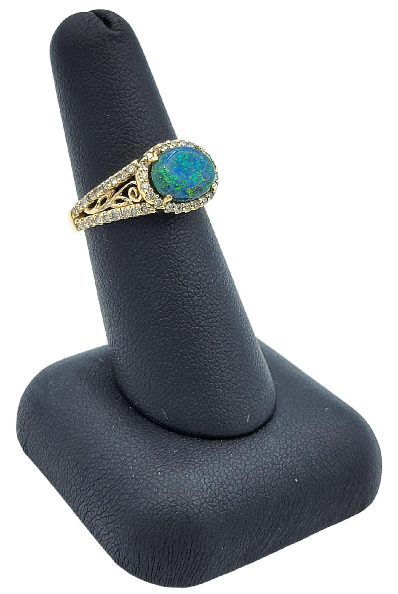 Tremonti East-West Oval Cut Black Opal Ring with Diamond Halo in 14 Karat Gold 7