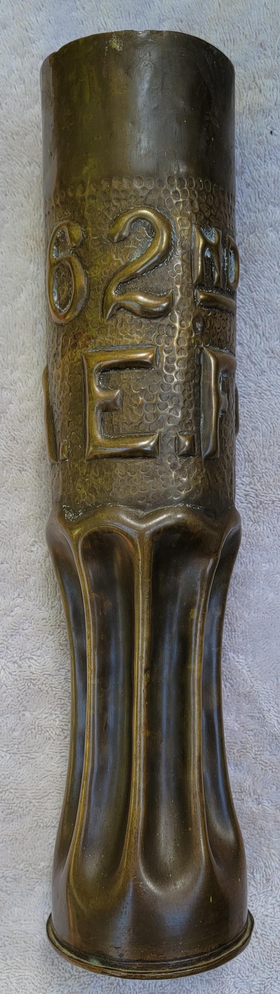 Extraordinary example of WWl Trench Art. Historical significance as this vase is signed by the soldier that crafted it, 