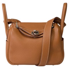 Trendy Hermes Lindy Mini 17 handbag strap in Gold Togo leather, PHW