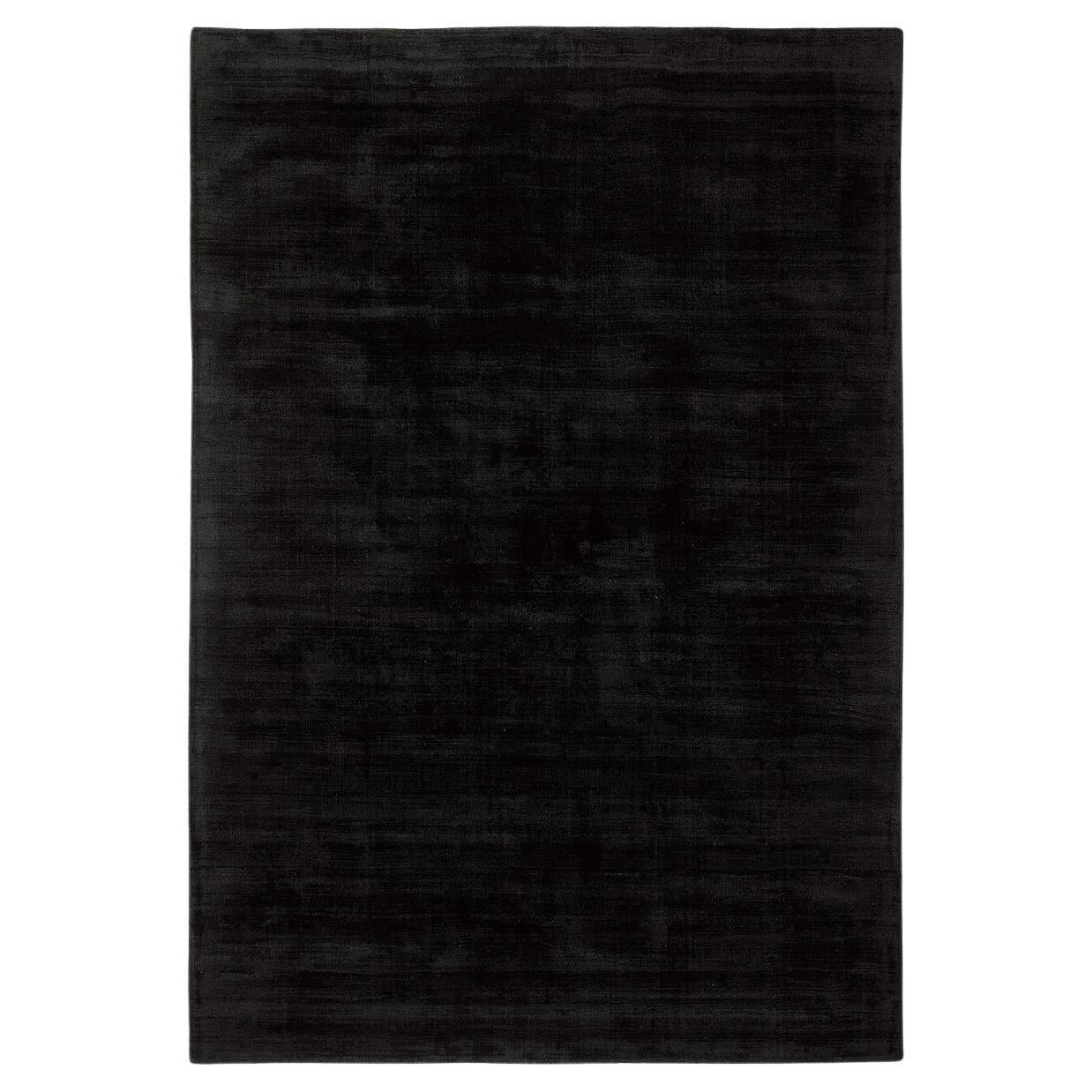 Trendiger glänzender schwarzer Teppich