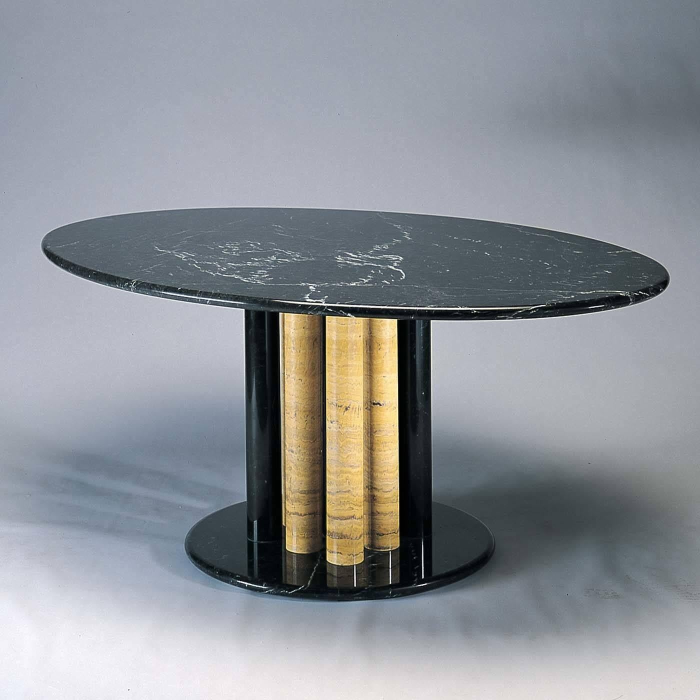 Italian design and traditional craftsmanship are harmoniously combined in this exquisite table designed by Sergio Asti in 2004 for Upgroup. The majestic oval top and the base are made of black Marquinia marble with six supporting columns, three of