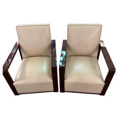 Très belle paire de Fauteuils en palissandre et cuir