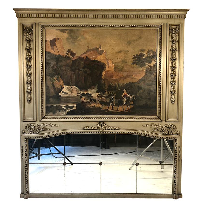 Très grand trumeau de style Louis XVI, bois laqué gris/vert, XIXe
Grande huile sur panneau, en partie haute,
figurant un paysage animé
Miroir en partie basse composé de huit éléments
Bon état général, quelques petits manques au tain
pas de