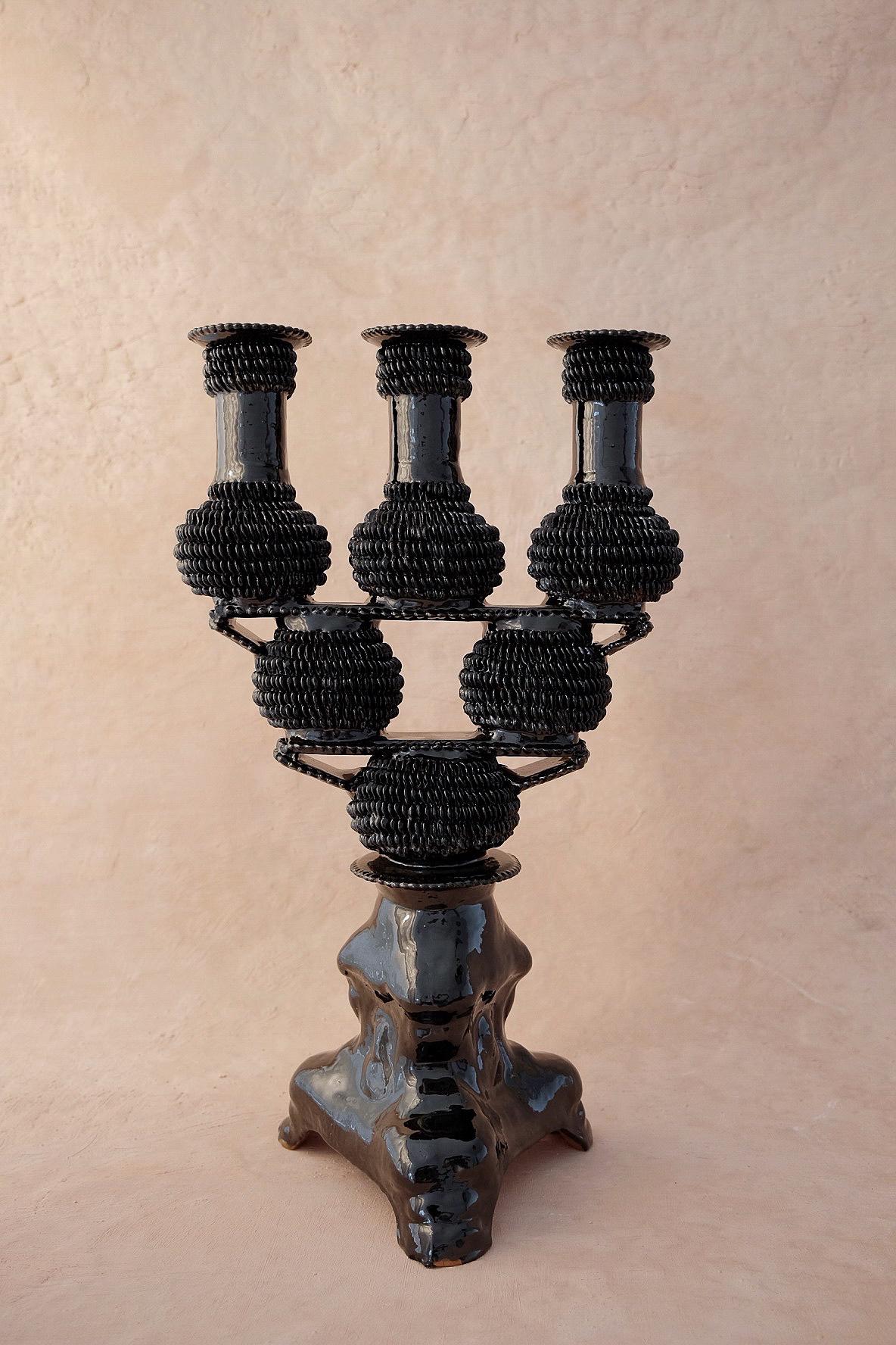 Tres Luces candleholder by Onora
Dimensions: W 28 x H 45.7 cm
Materials: Clay, Glazed pottery

Hand sculpted clay, covered with a mineral based slip and burnished using a quartz stone. The “Circo Collection” is a reproduction of Herón Martínez