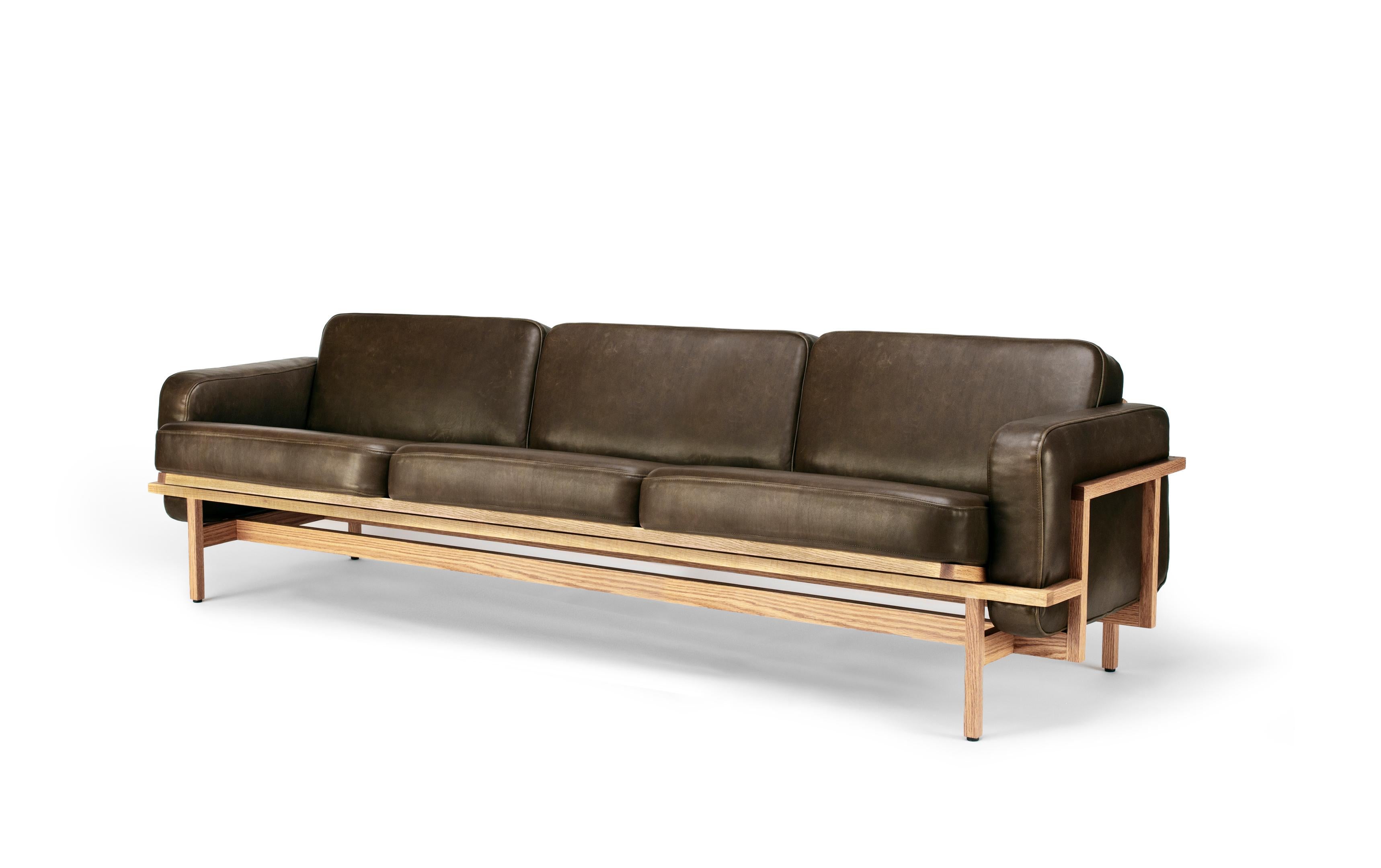 This Tres Plazas is a true masterpiece of design and craftsmanship. The structure of the sofa stands tall, almost like a tribute to the art of furniture-making. The delicate framework of wood is not only visually stunning, but also allows for the